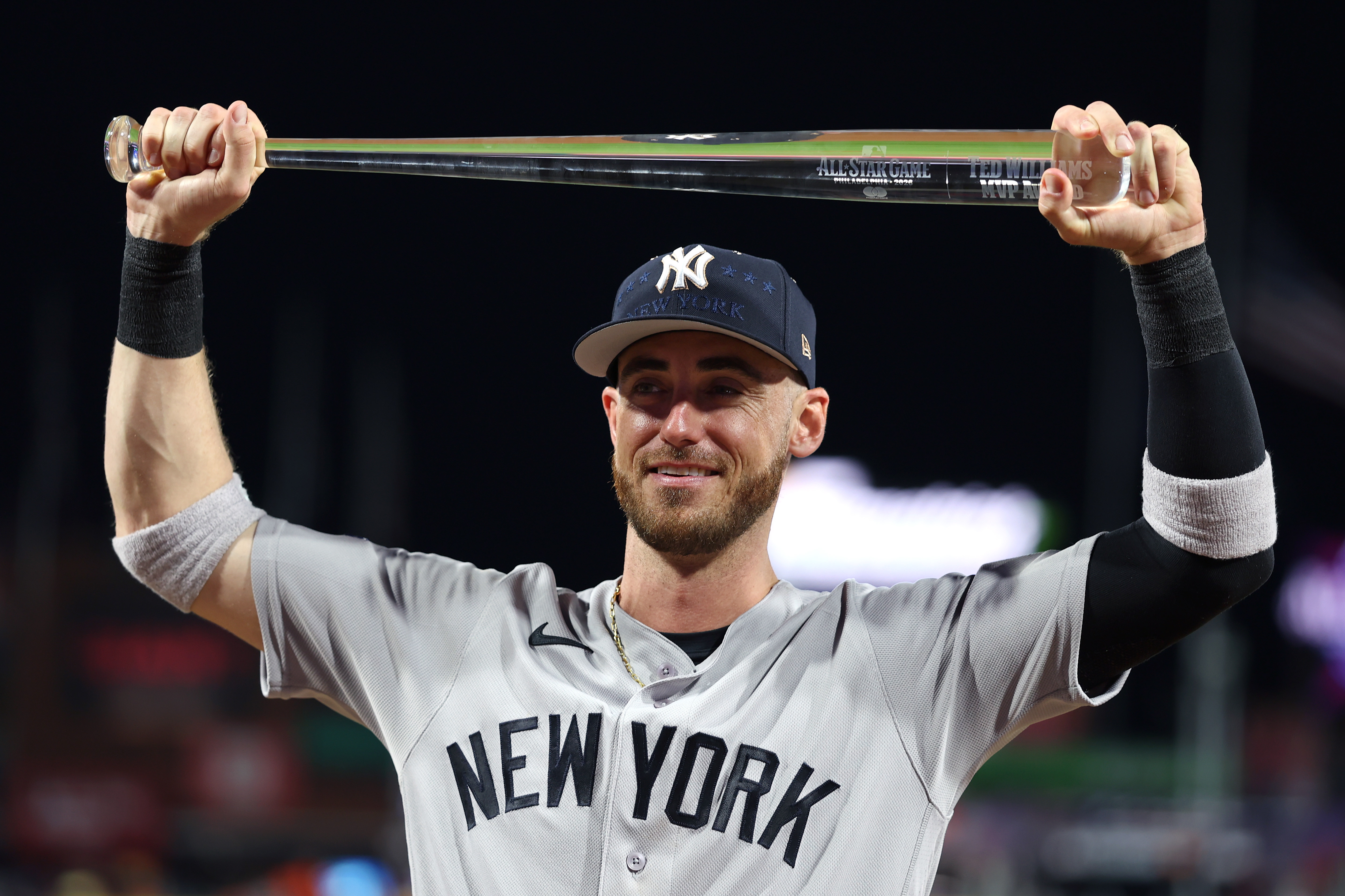Cody Bellinger poses with the MLB All-Star Game MVP trophy in July 2026. 