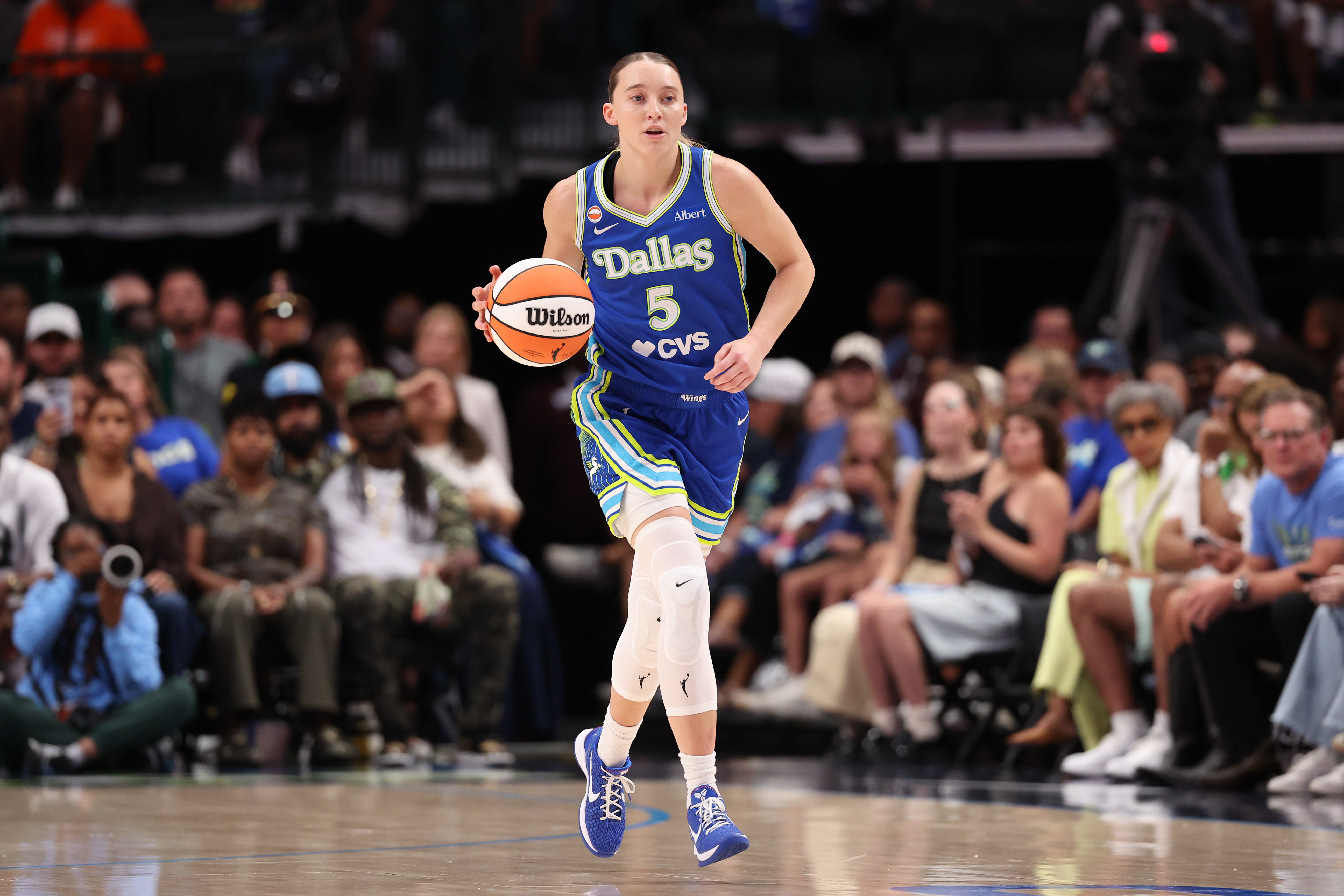 Paige Bueckers dribbles the ball up the court during a Dallas Wings-Chicago Sky game in July 2026. 