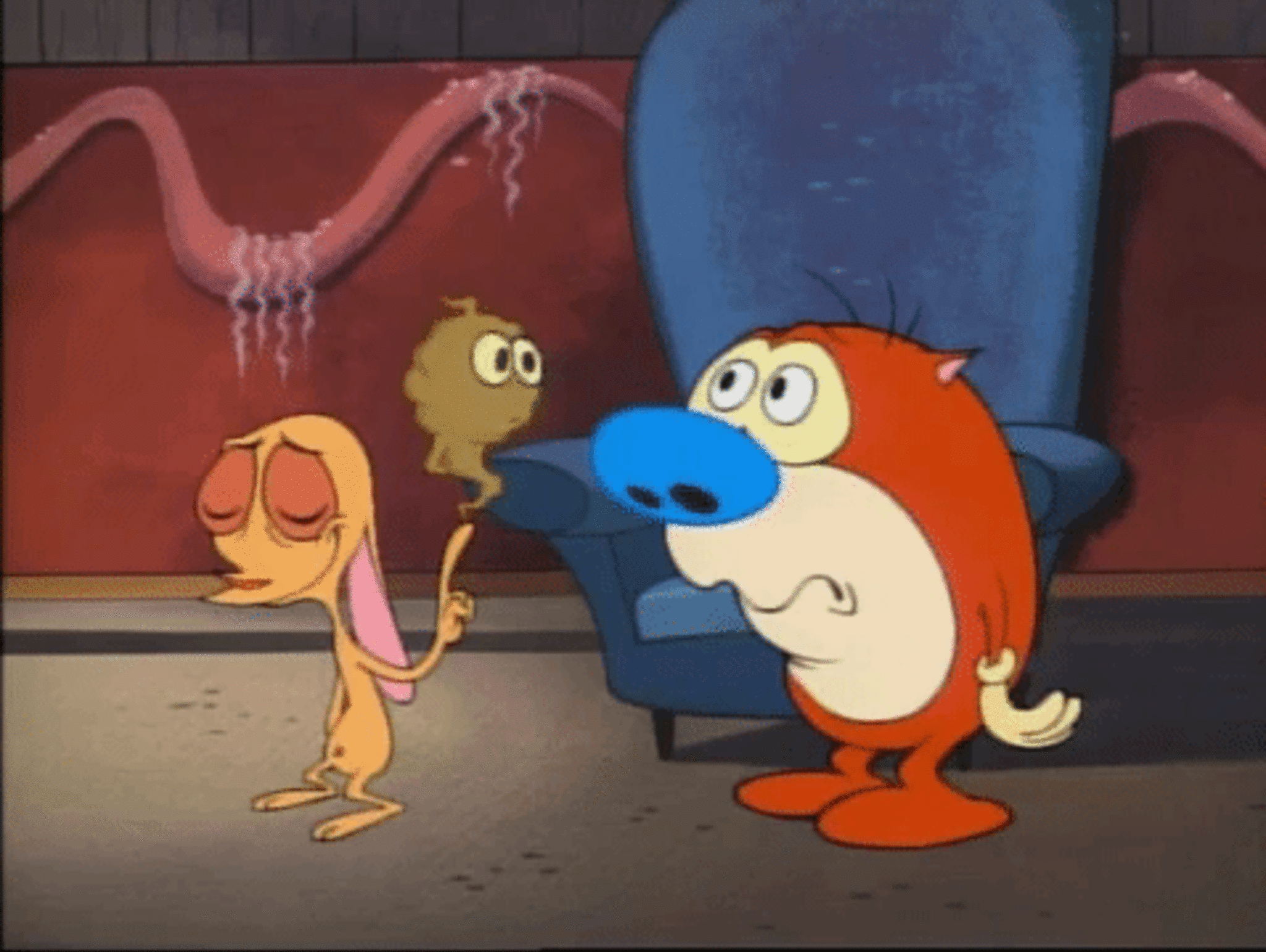 Ren and Stimpy stand in a room with a chair, looking puzzled. Ren holds a small, smoking creature.