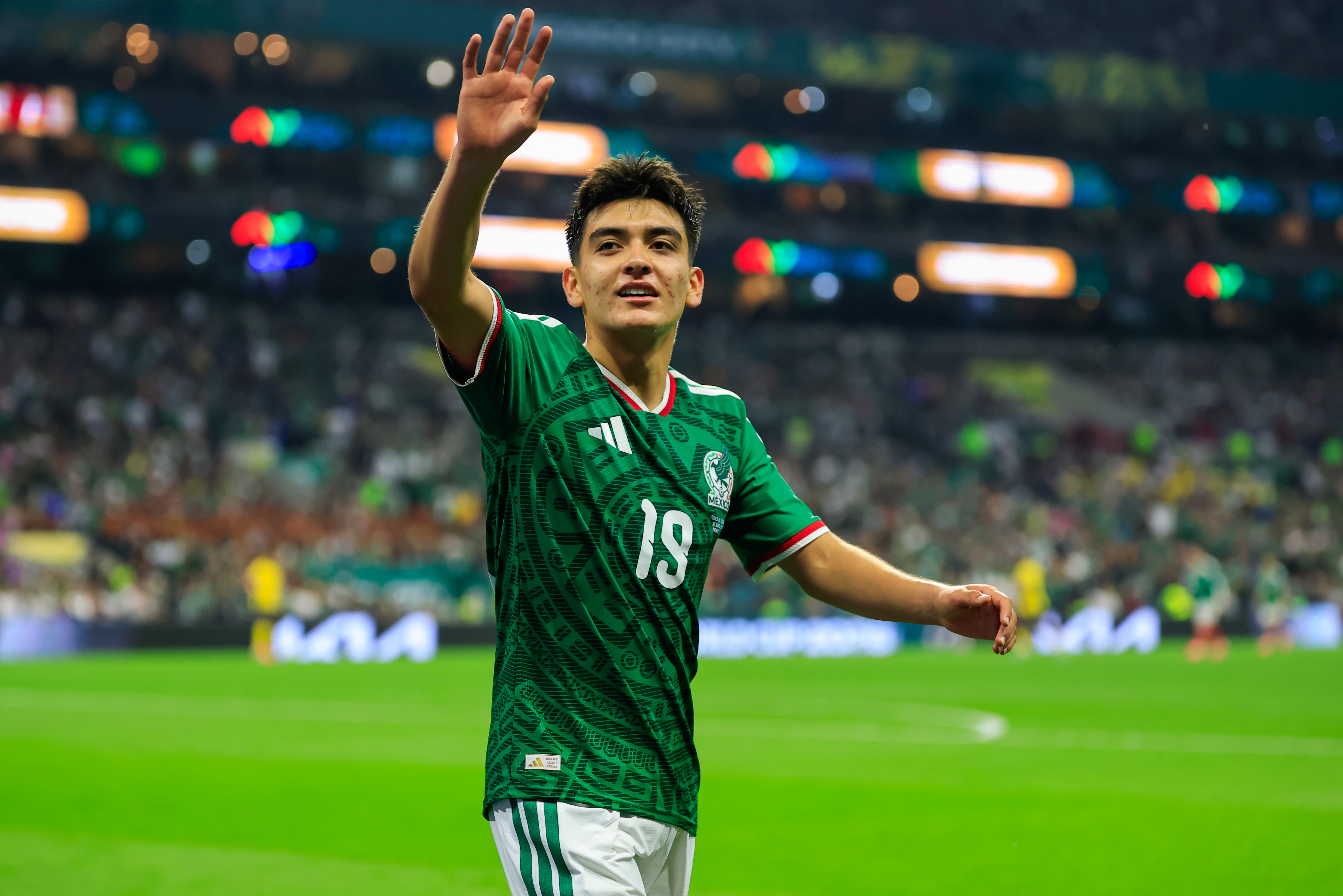 Gilberto Mora waves to the fans during Mexico's match against Ecuador during the knockout stage of the 2026 FIFA World Cup. 
