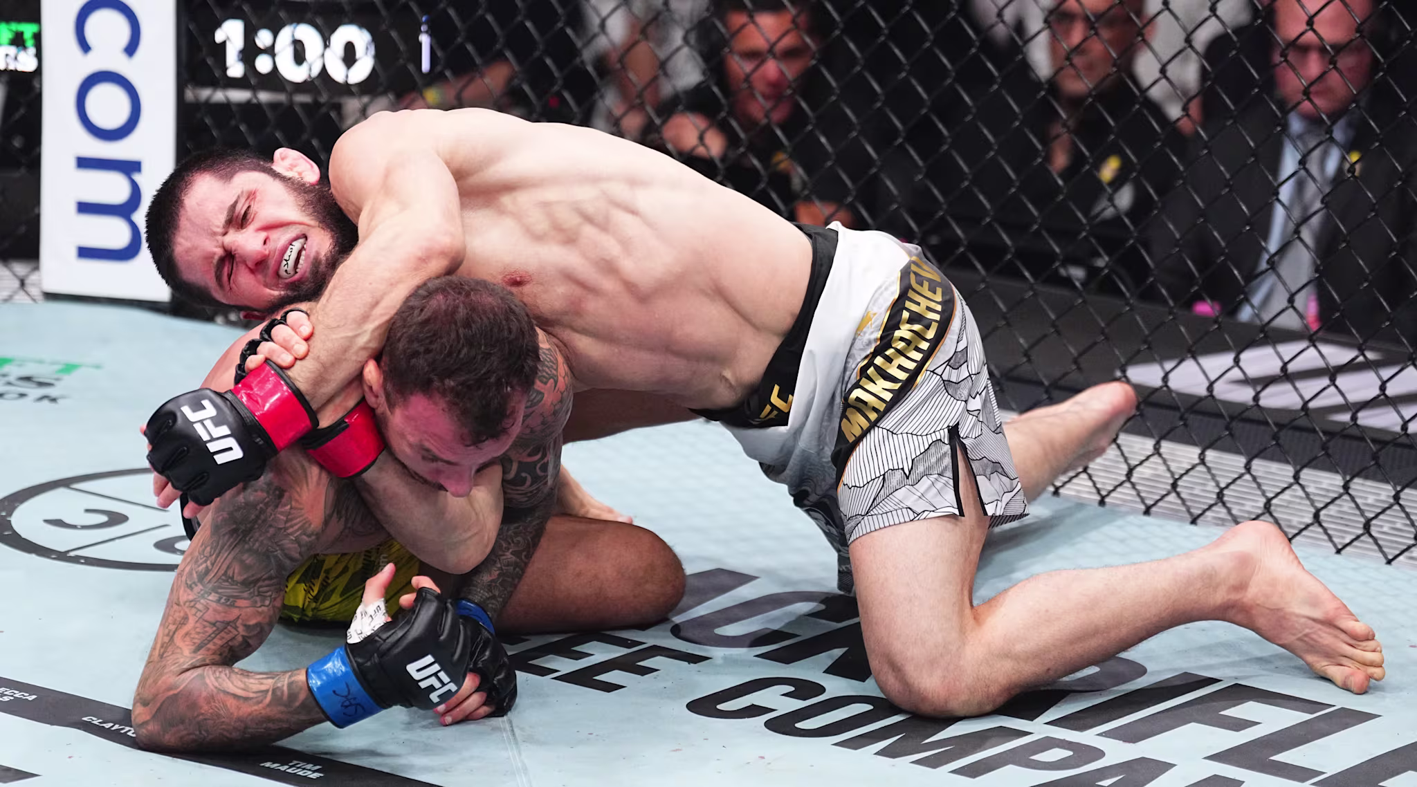 Islam Makhachev of Russia secures a submission against Renato Moicano of Brazil in the UFC lightweight championship fight during the UFC 311 event at Intuit Dome on January 18, 2025 in Inglewood, California.