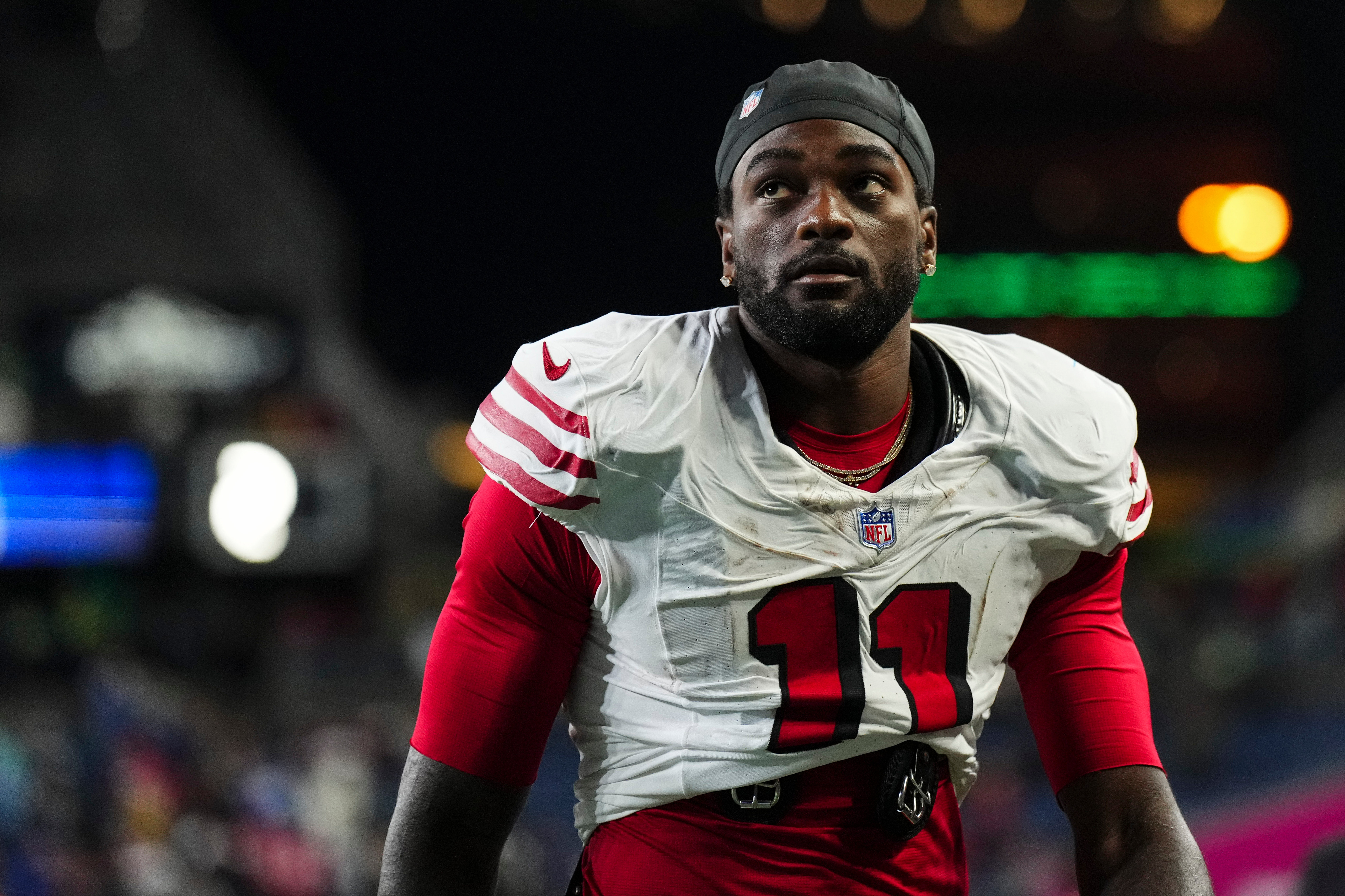 Brandon Aiyuk walks off the field after a San Francisco 49ers-Seattle Seahawks game in 2024. 
