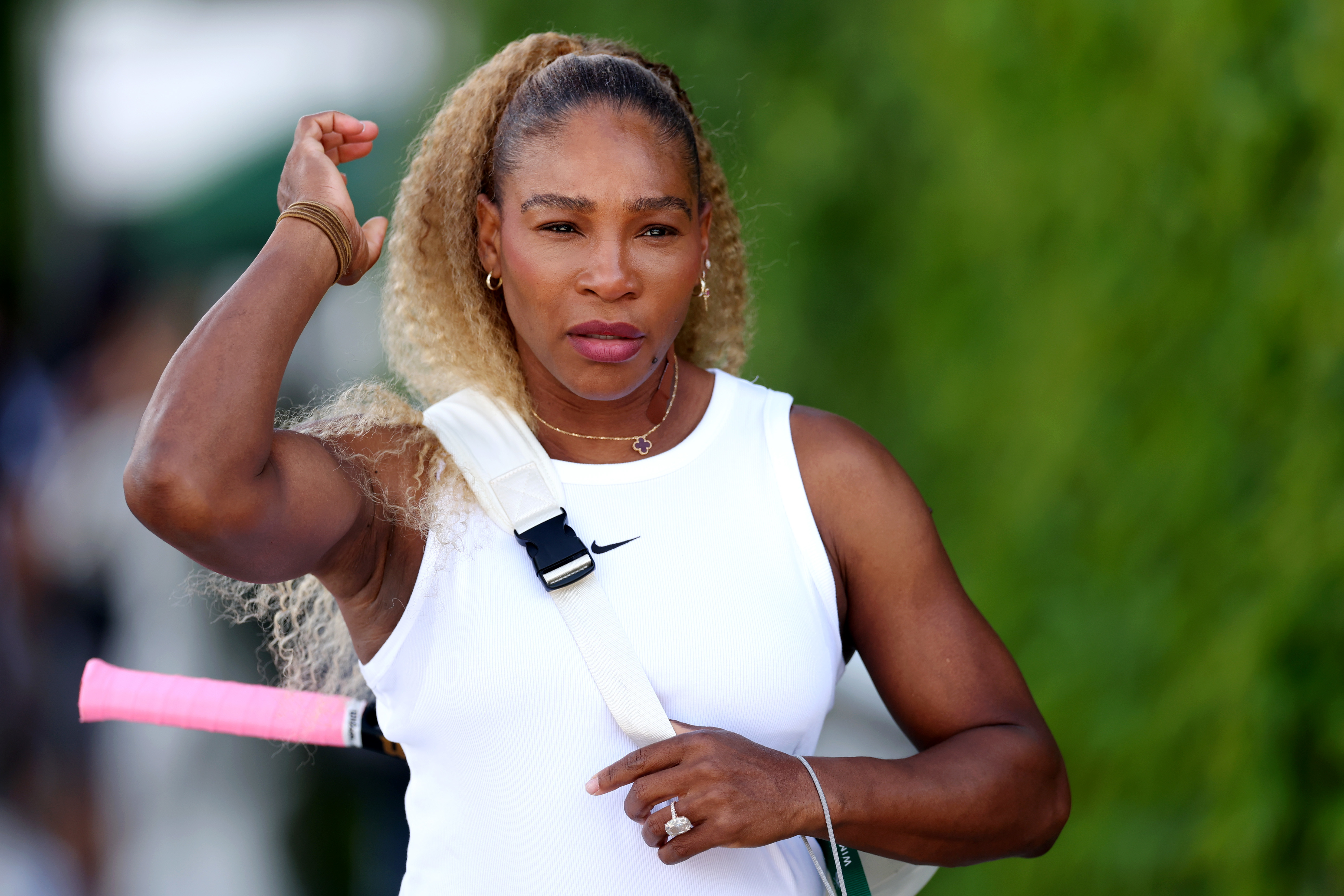 Serena Williams heads to the practice court at Wimbledon. 