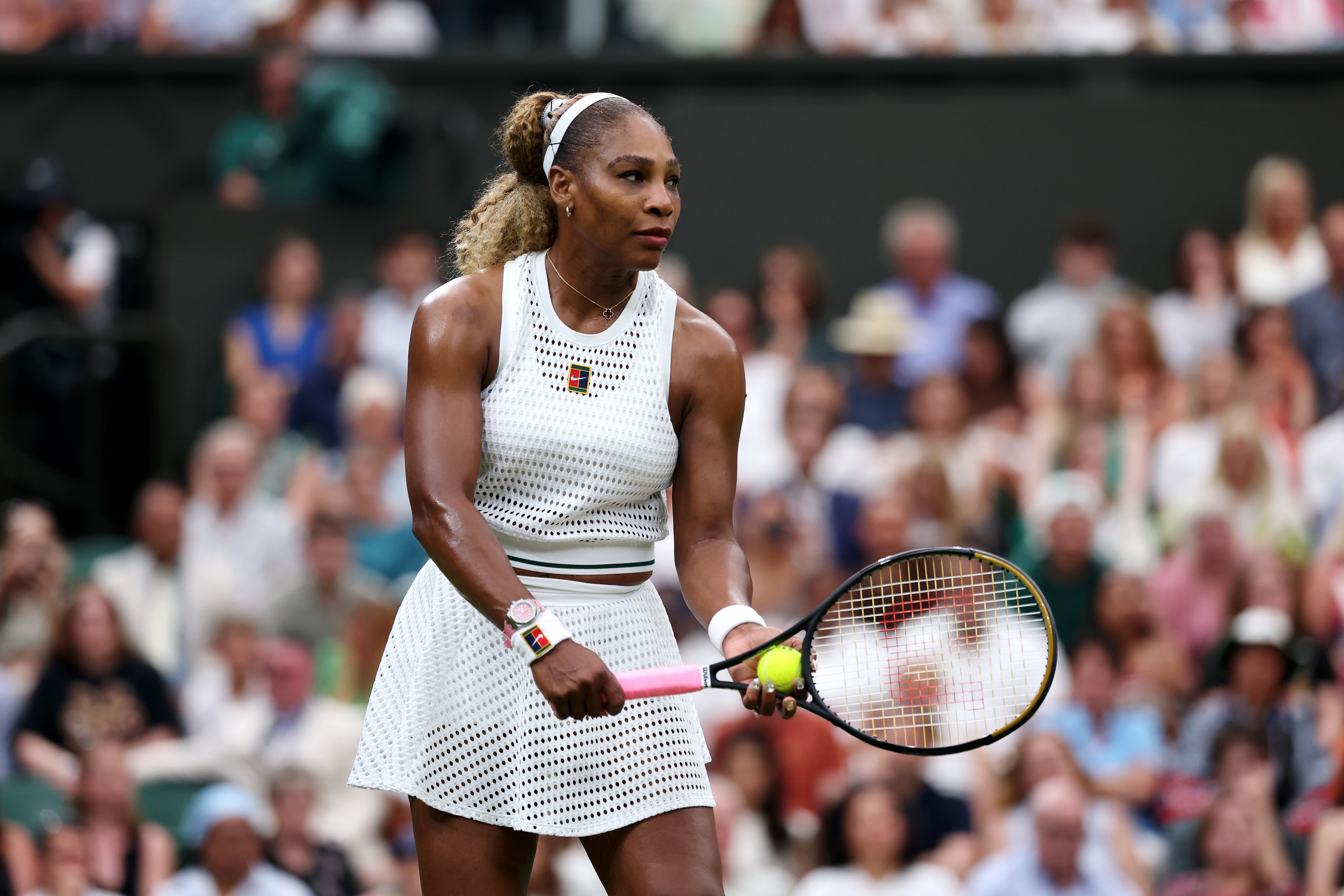 Serena Williams prepares to serve during her first round match at the 2026 Wimbledon. 