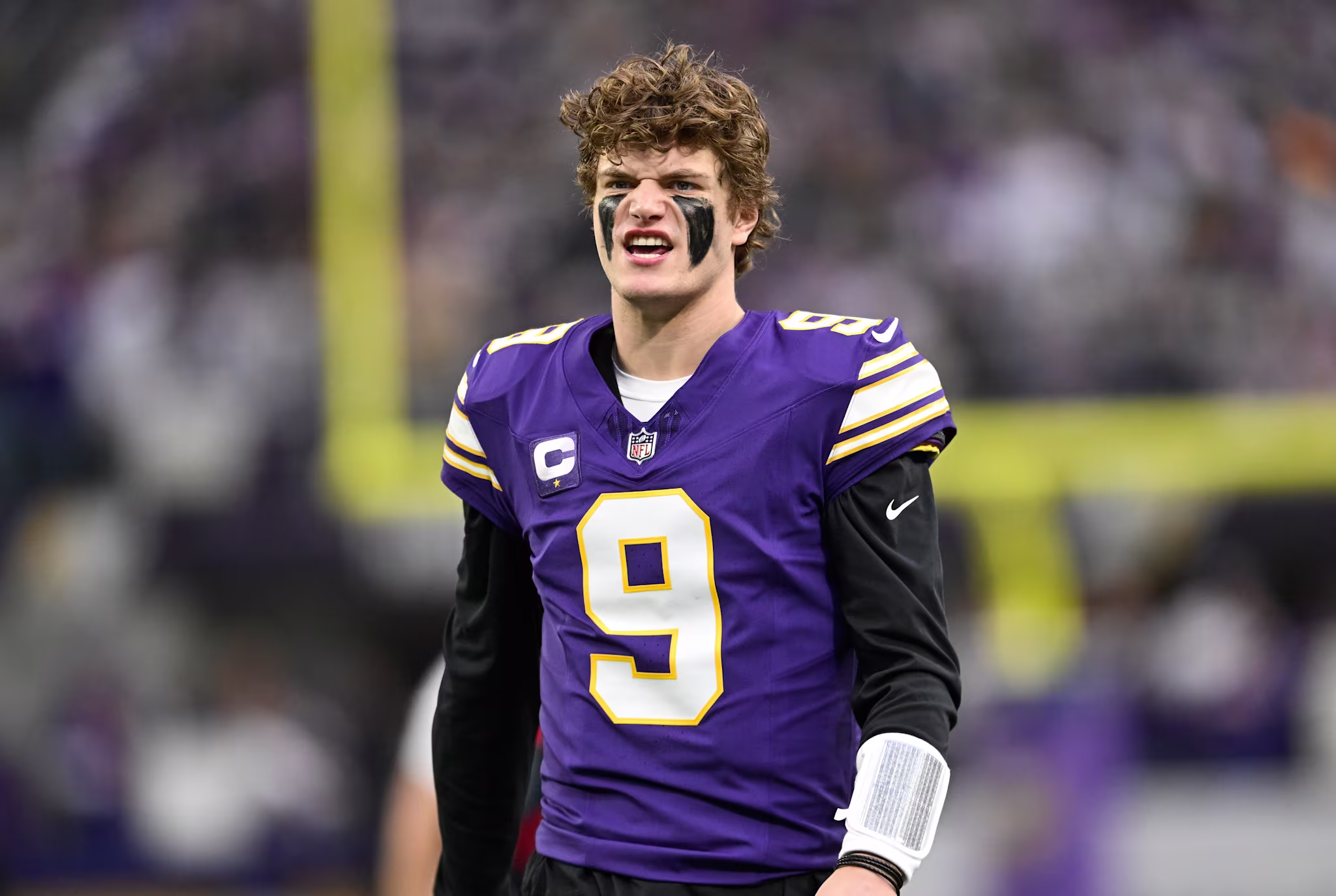 JJ McCarthy warms up prior to a Minnesota Vikings-Green Bay Packers game in January 2026. 