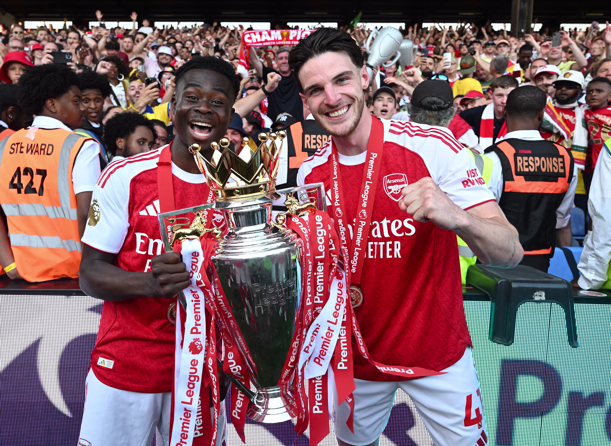 Bukayo Saka and Declan Rice celebrate after Arsenal clinched the Premier League title. 
