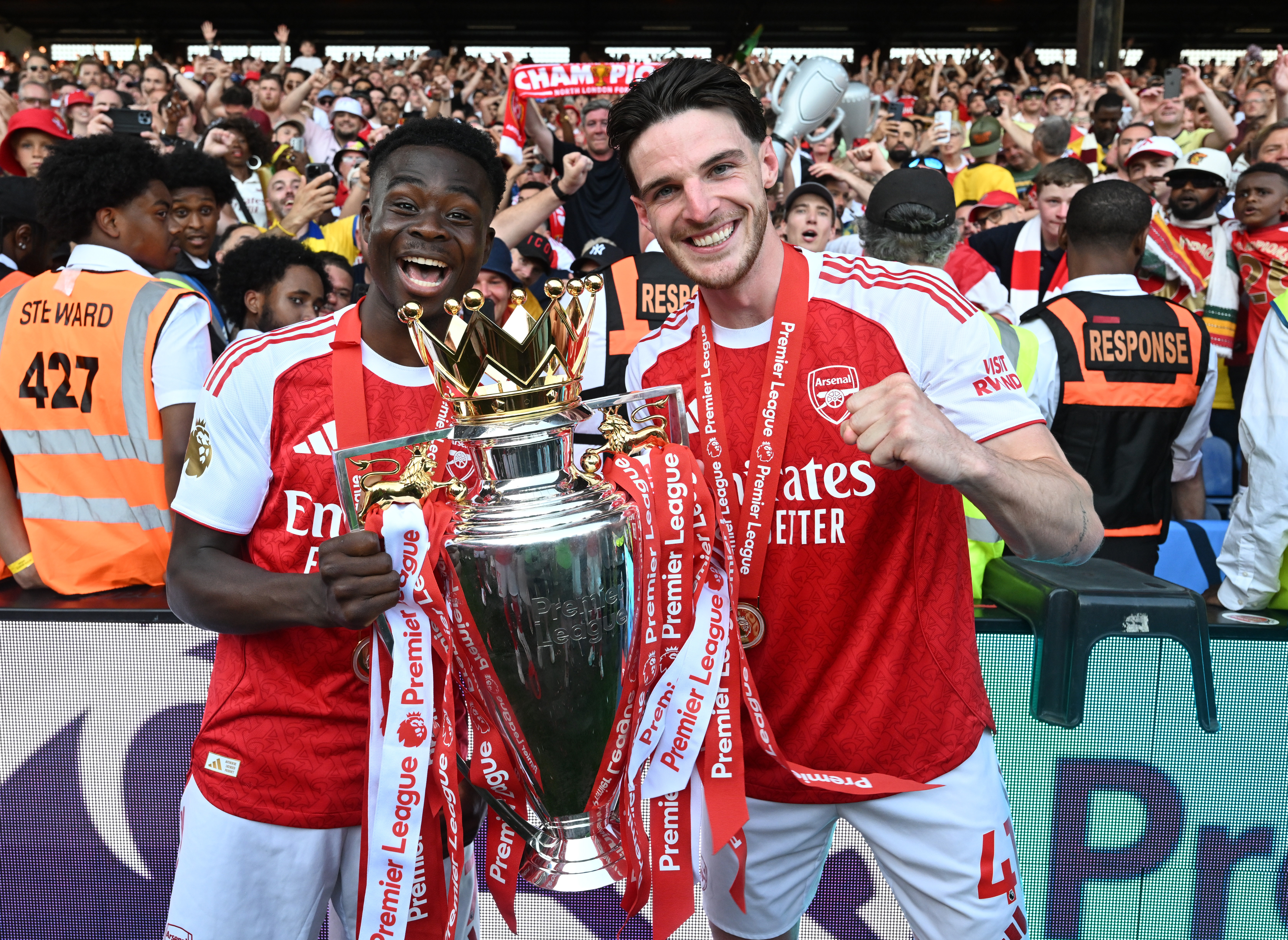 Bukayo Saka and Declan Rice celebrate after Arsenal clinched the Premier League title. 