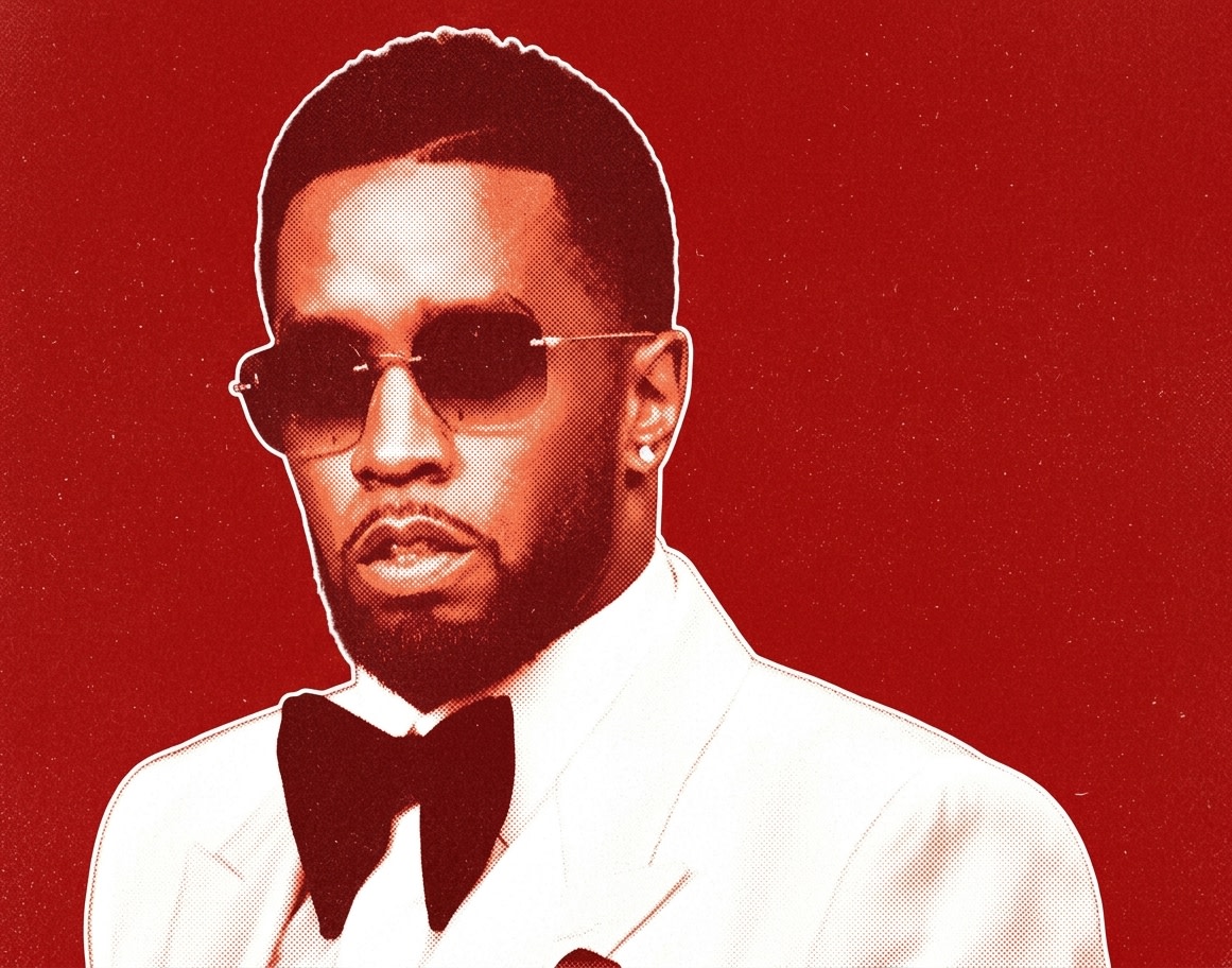 Diddy in a white suit with sunglasses and a bow tie against a red background.
