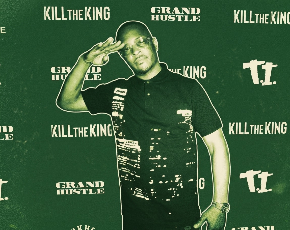 Rapper T.I. in front of a backdrop that says "Kill the King," "Grand Hustle," and "T.I." logos.