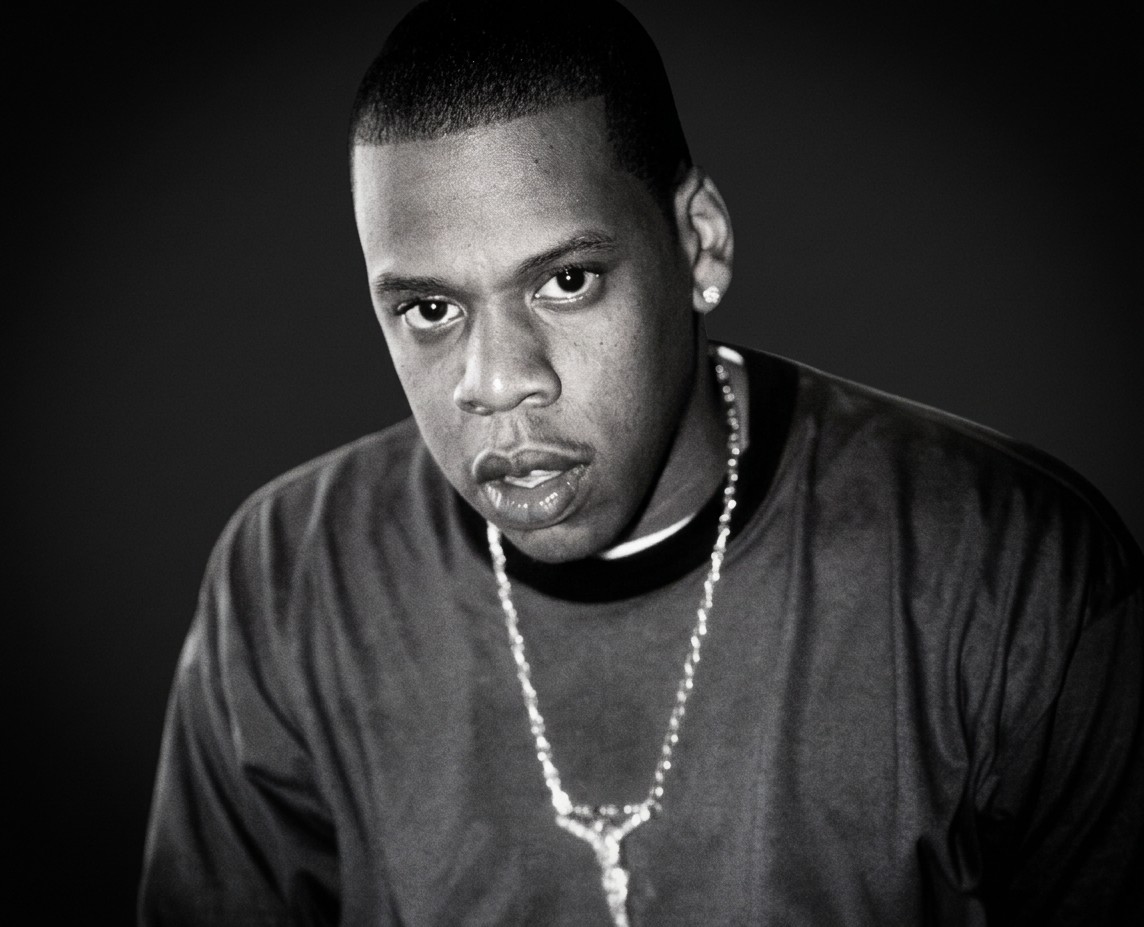 Black and white photo of a young Jay-Z from 1996 era, this is when he was getting ready to release Reasonable Doubt. 