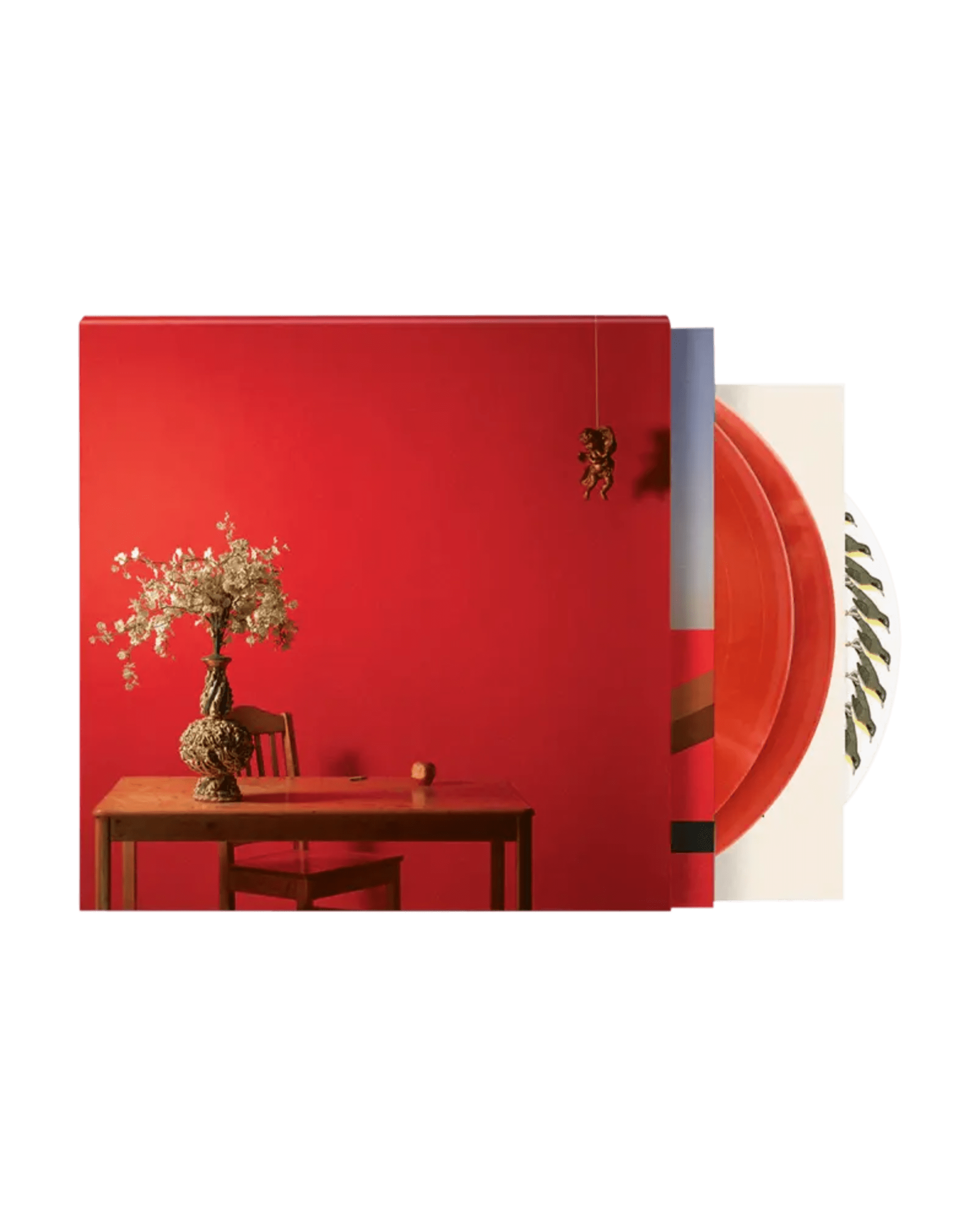 A red vinyl record album cover featuring a table with a vase of flowers against a red wall.