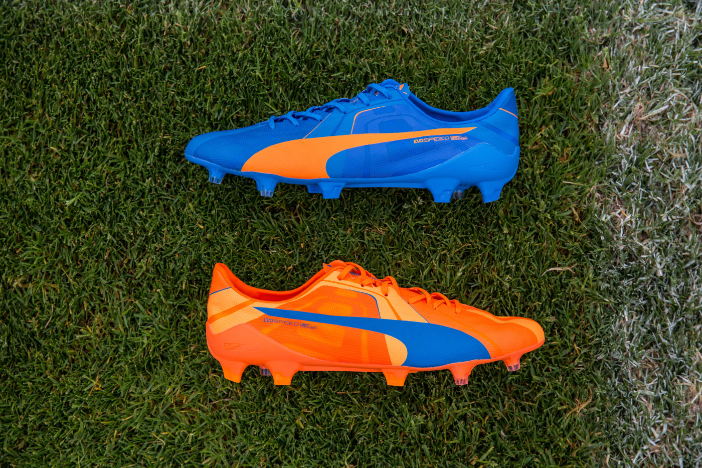 puma different coloured football boots