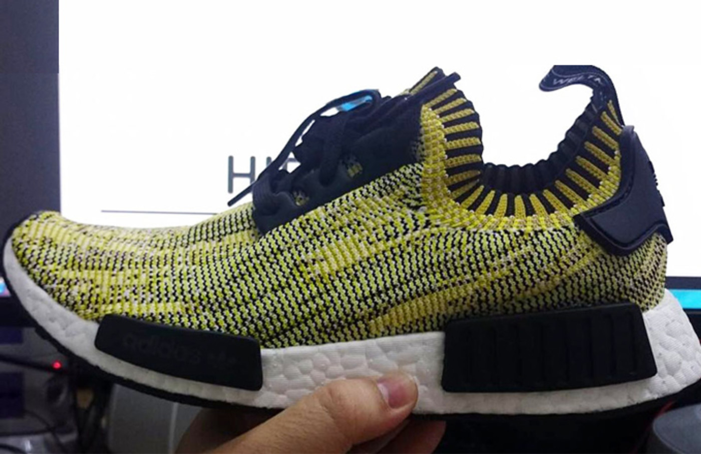 black and yellow nmds