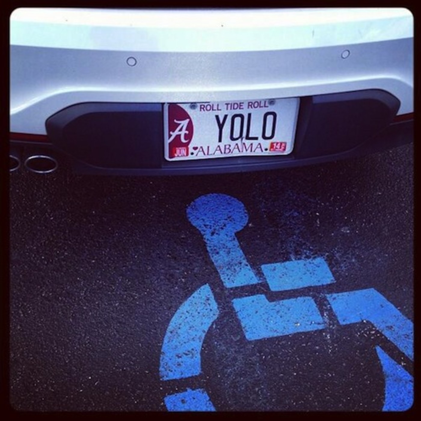 Troll Tide Bama Fan Sits In A Handicapped Spot With A Yolo Vanity Plate Complex Video memes and tv shows: complex