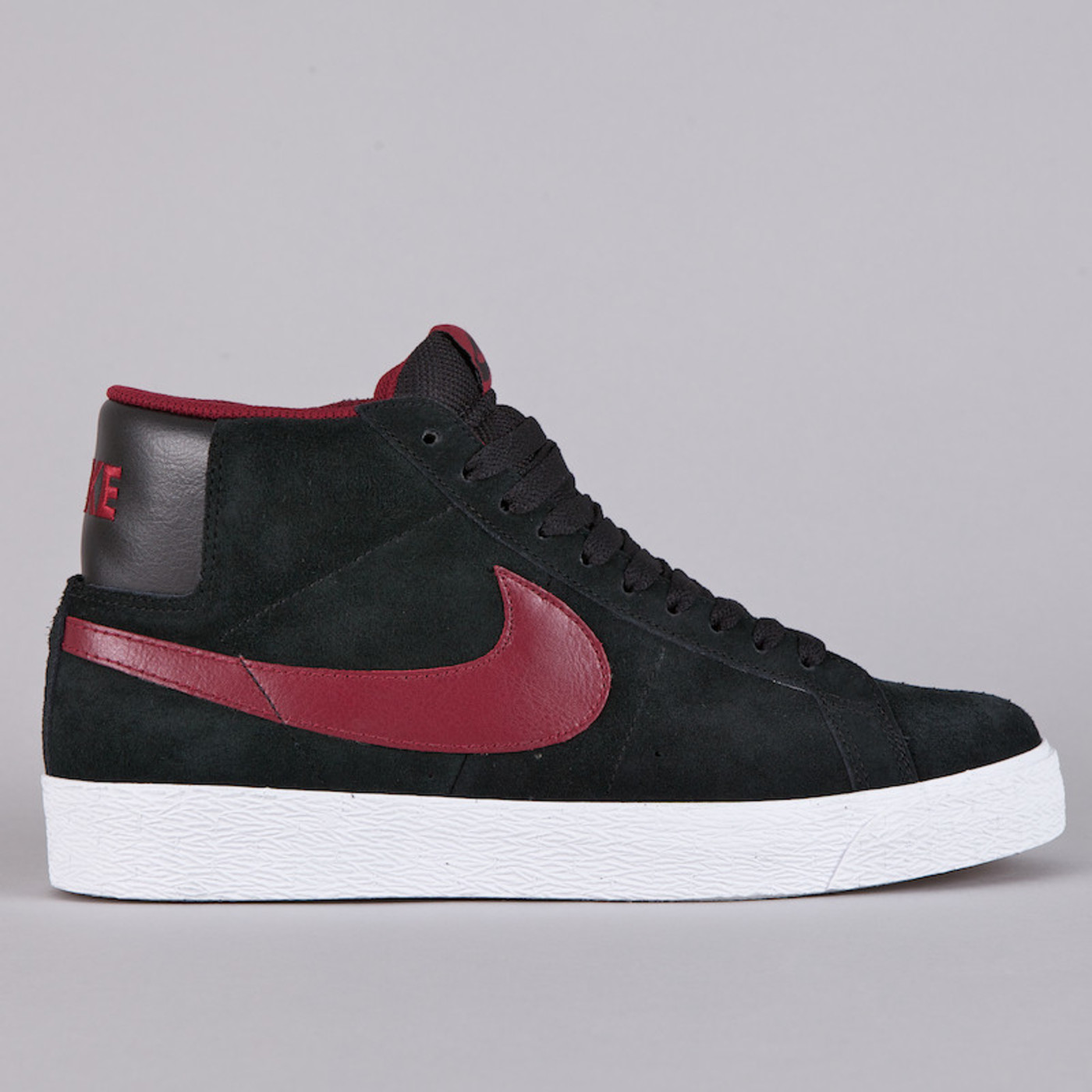 black nike with red swoosh
