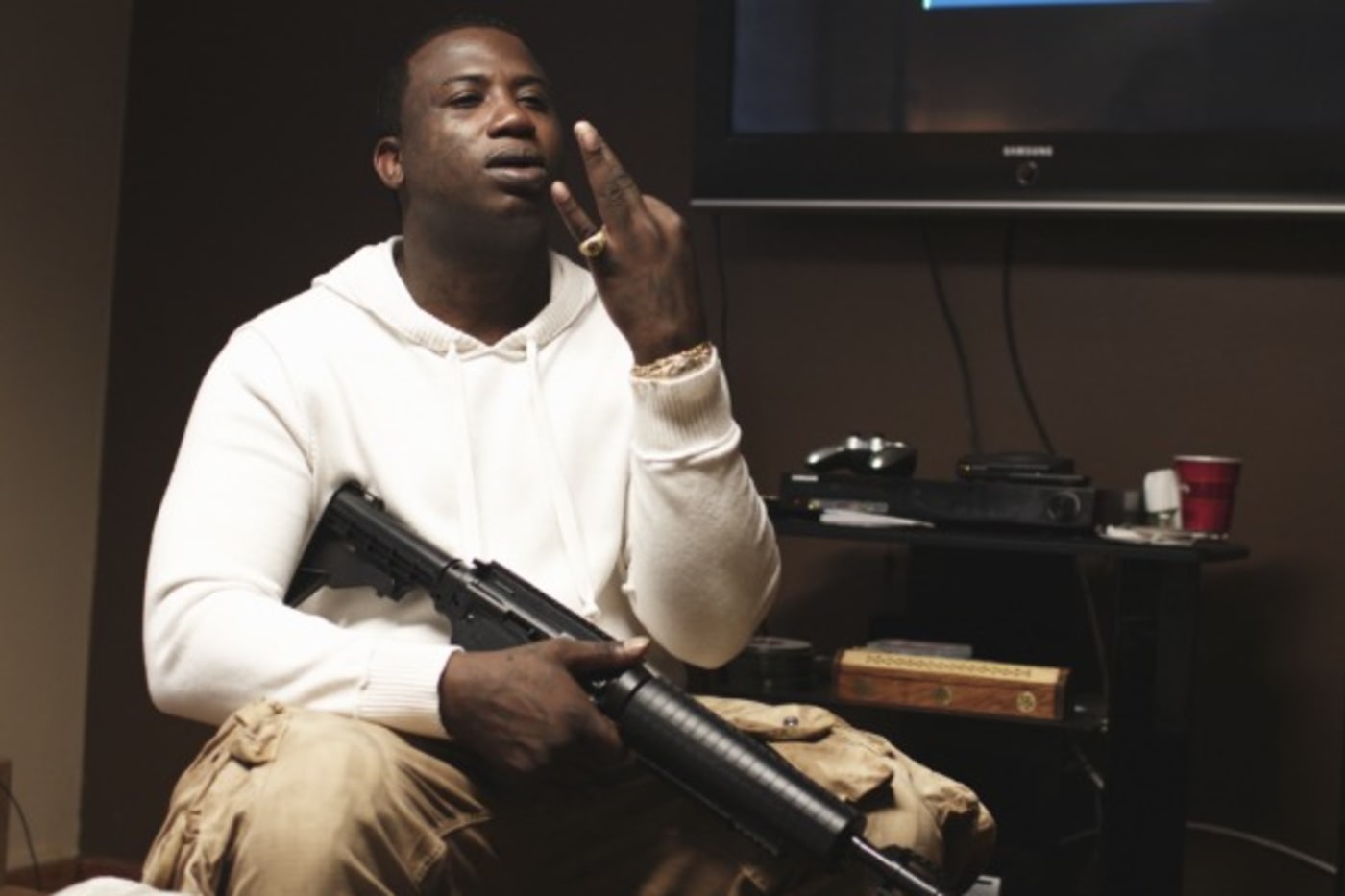 A Gucci Mane Photo Exhibit Held in a Trap House Will Open This Week |  Complex