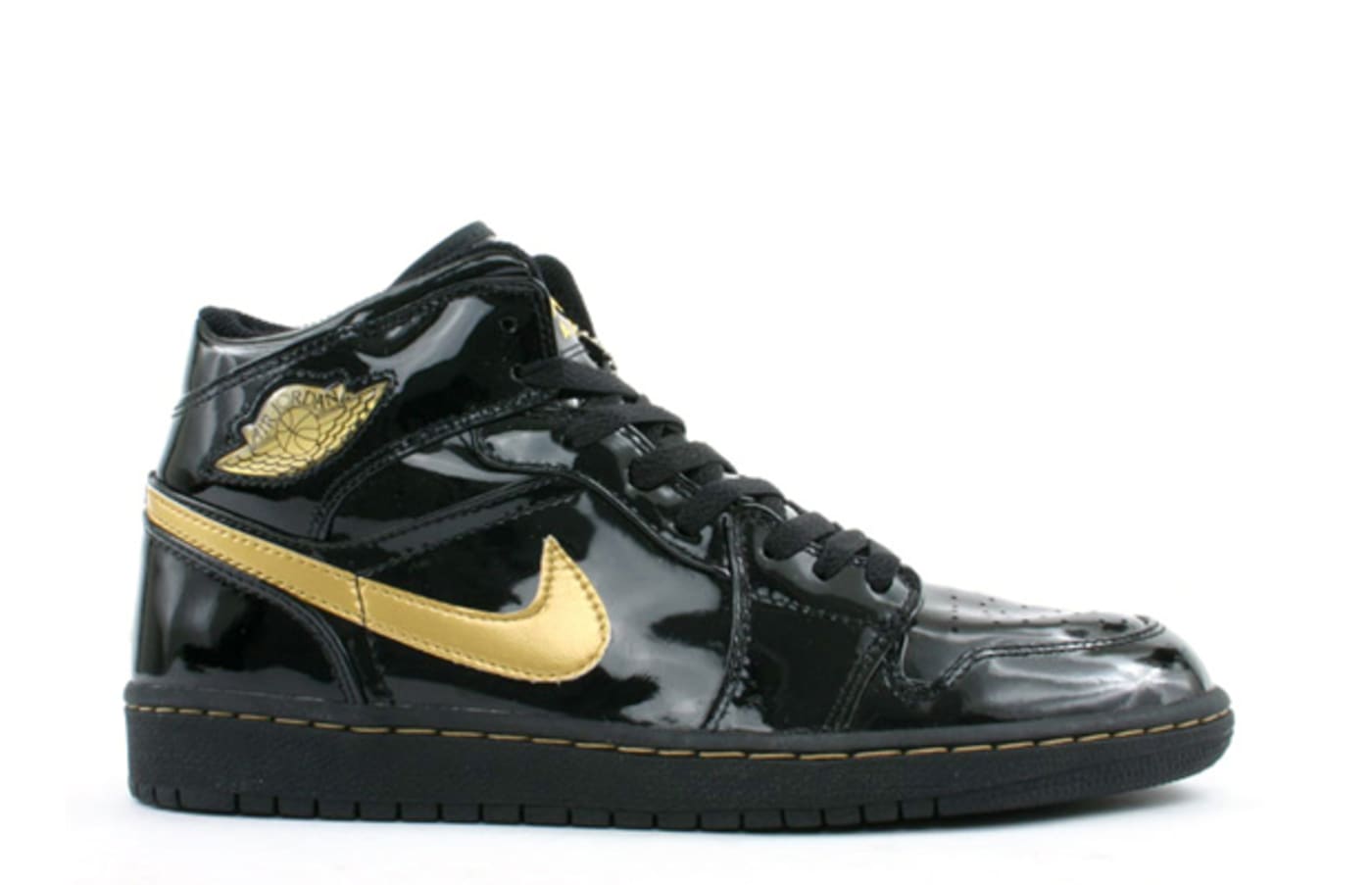 black jordans with gold trim