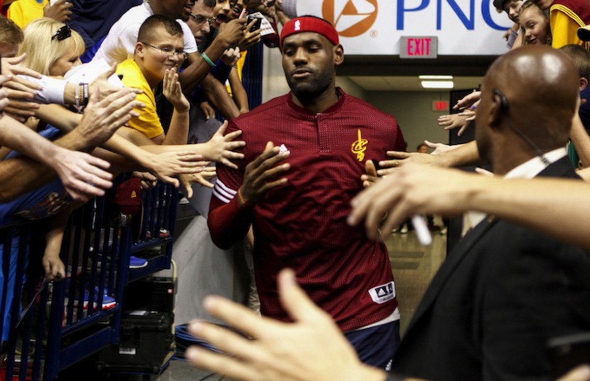 LeBron James Takes Selfie With Fans During Cavs/Hawks Preseason Game