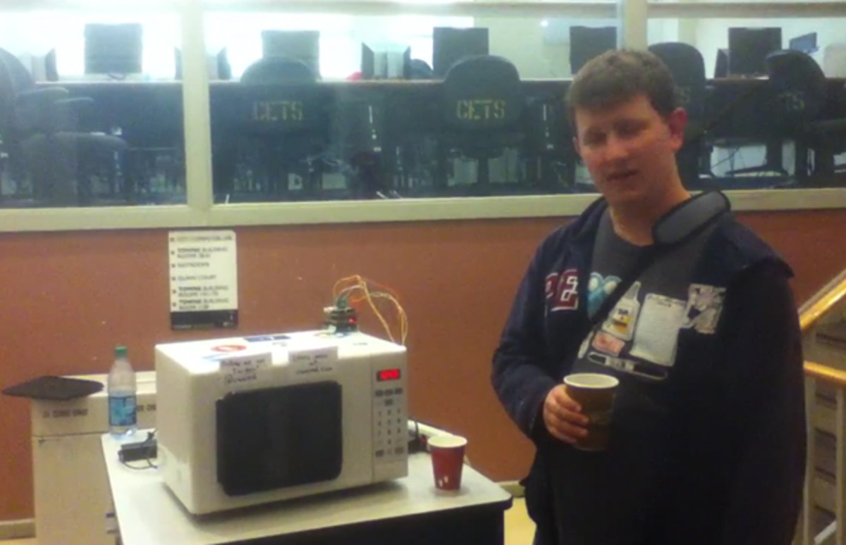 Video College Students Combine A Microwave and A Tablet Complex
