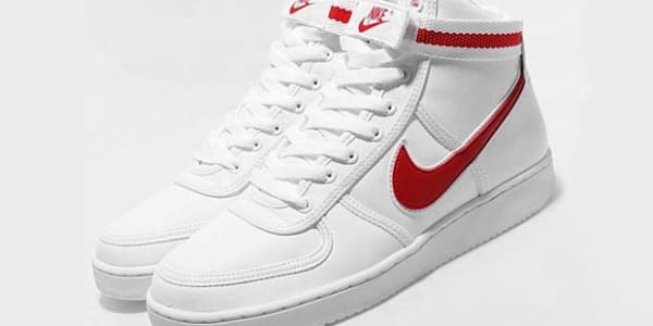white nikes with red stripe