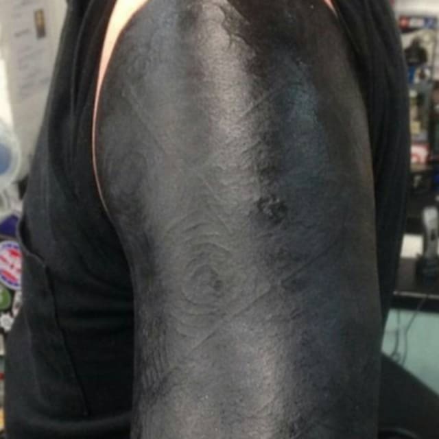 The Blackout Tattoo Trend Is Pretty Intense | Complex