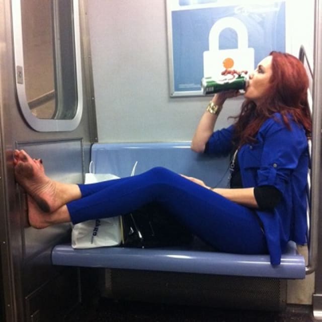 Guzzling Beer Barefoot on the Subway Is So NYC Complex