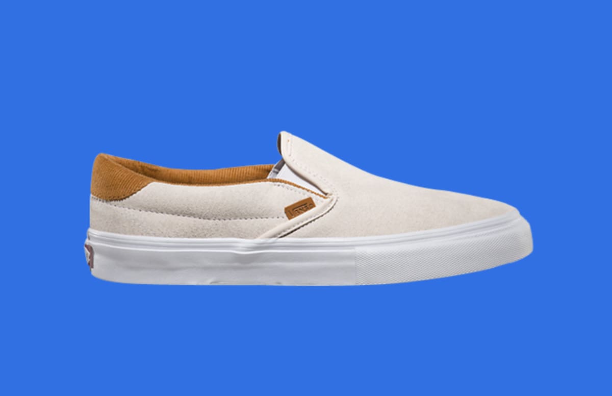 white perf leather slip on vans