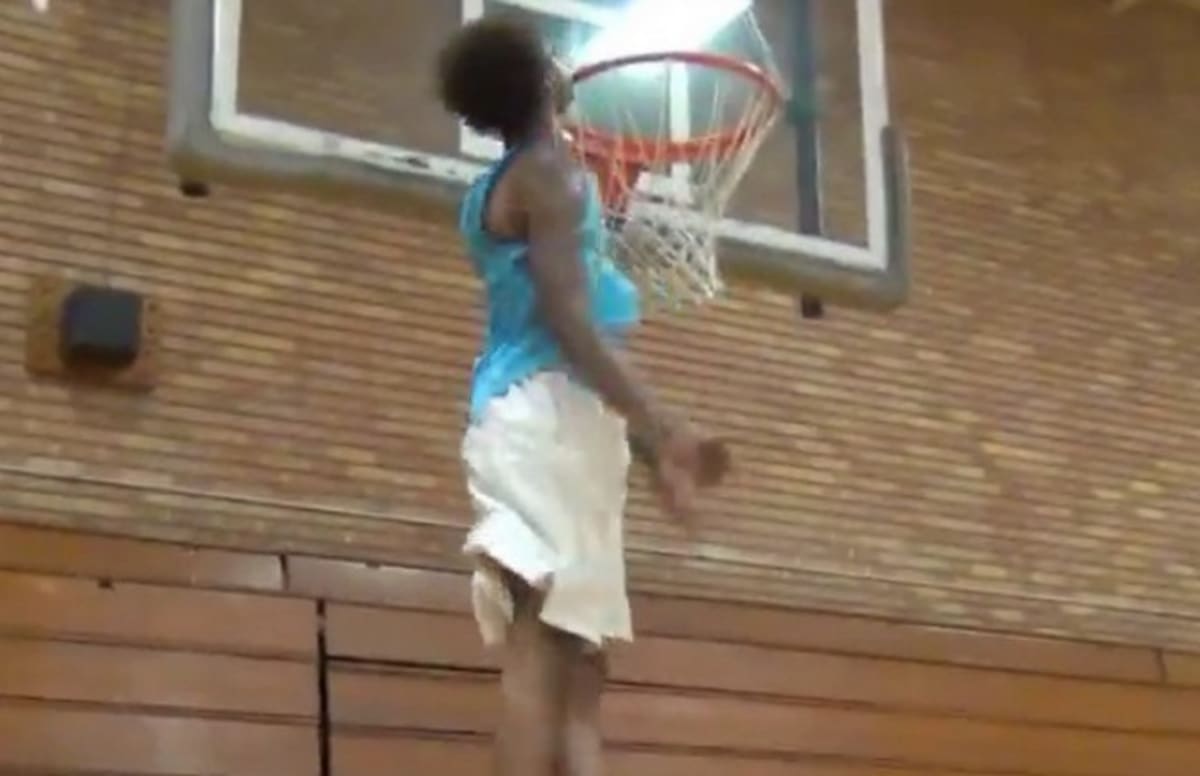 Watch a High School Basketball Player Hit His Chin on a Rim to Show Off