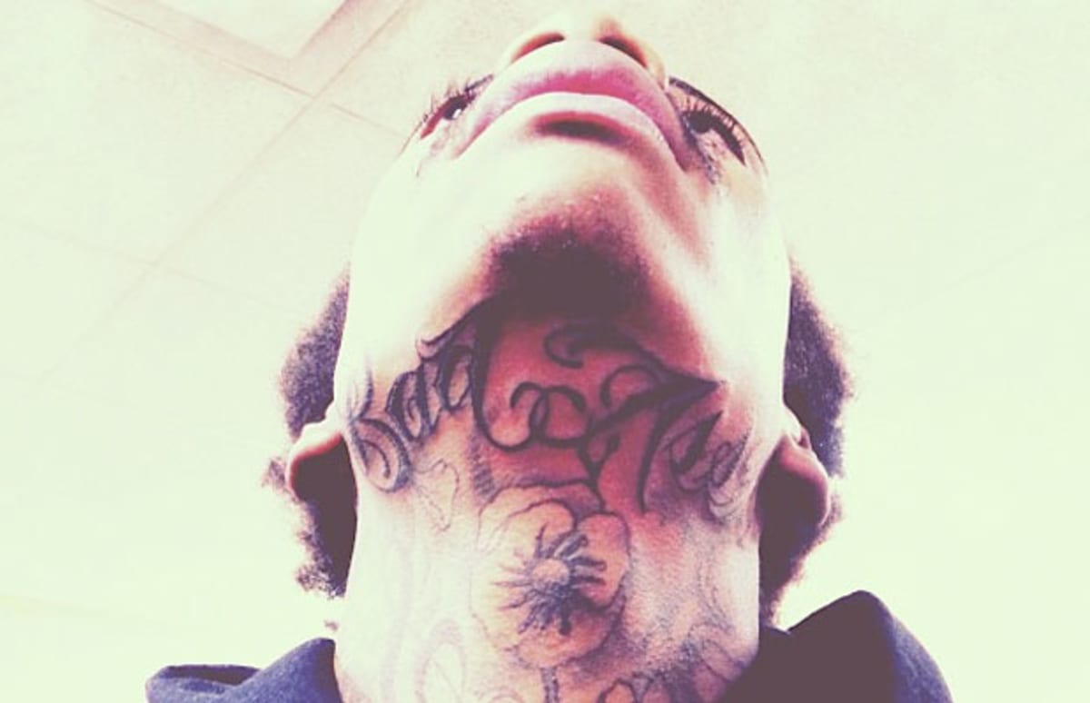 Wiz Khalifa Gets "Bad Ass" Tattooed On His Neck | Complex
