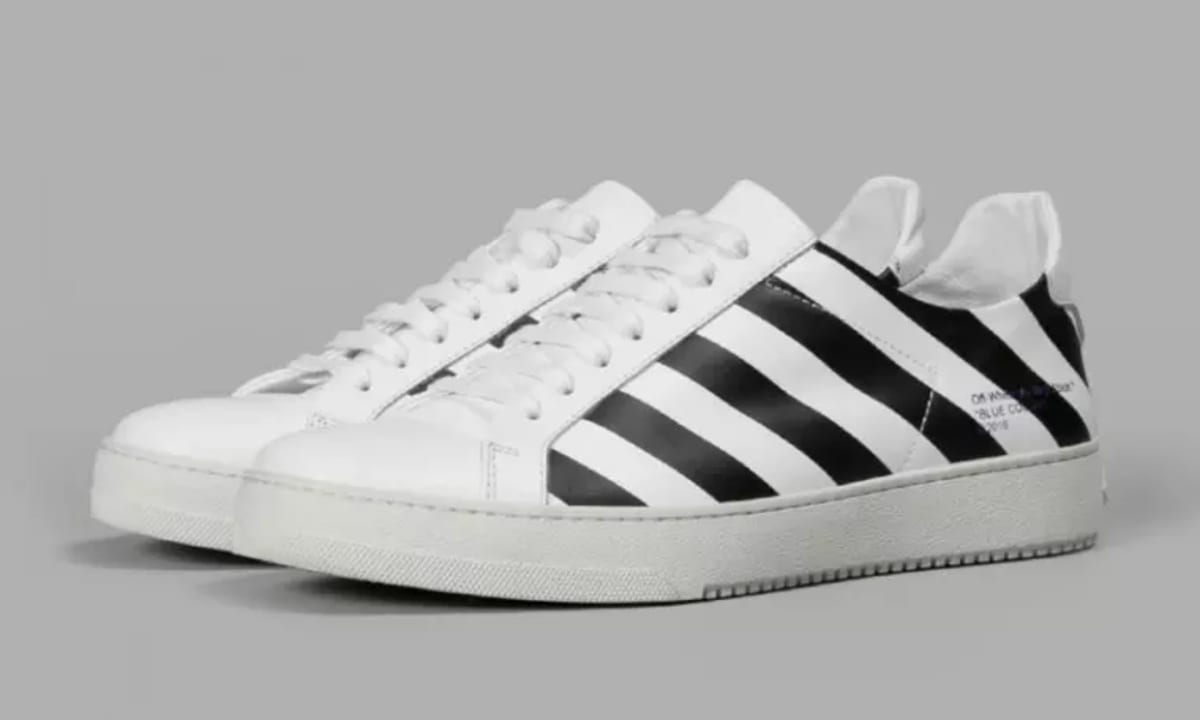 white sneakers with stripes