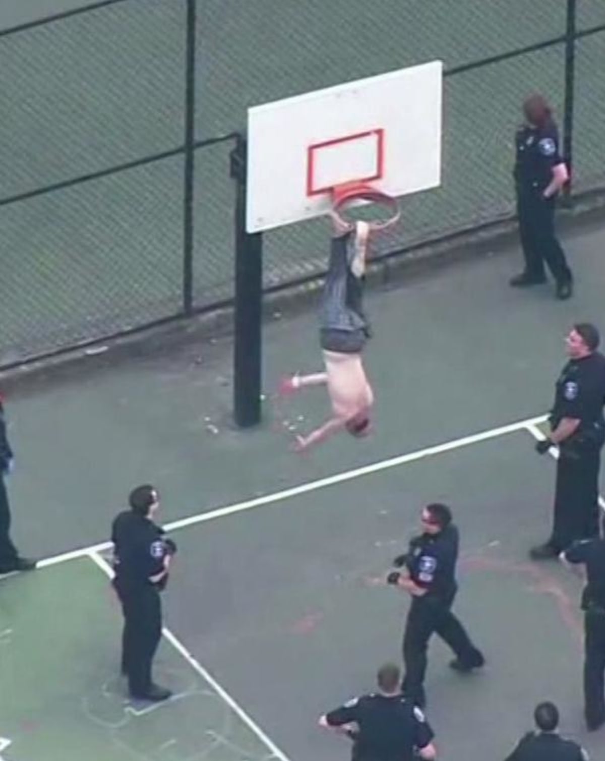 Man Gets Stuck in Basketball Hoop, Has to be Rescued by Police and