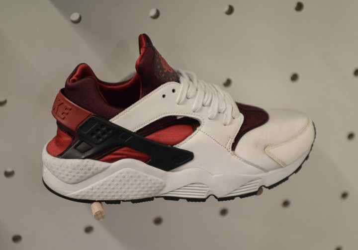 red huaraches with white bottoms