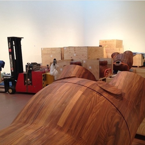 One of KAWS' Massive Wooden Sculptures Is Going Home With Swizz Beatz