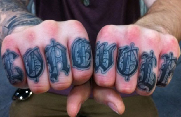 lone wolf - Hate Or Love? The 10 Best Knuckle Tattoos | Complex