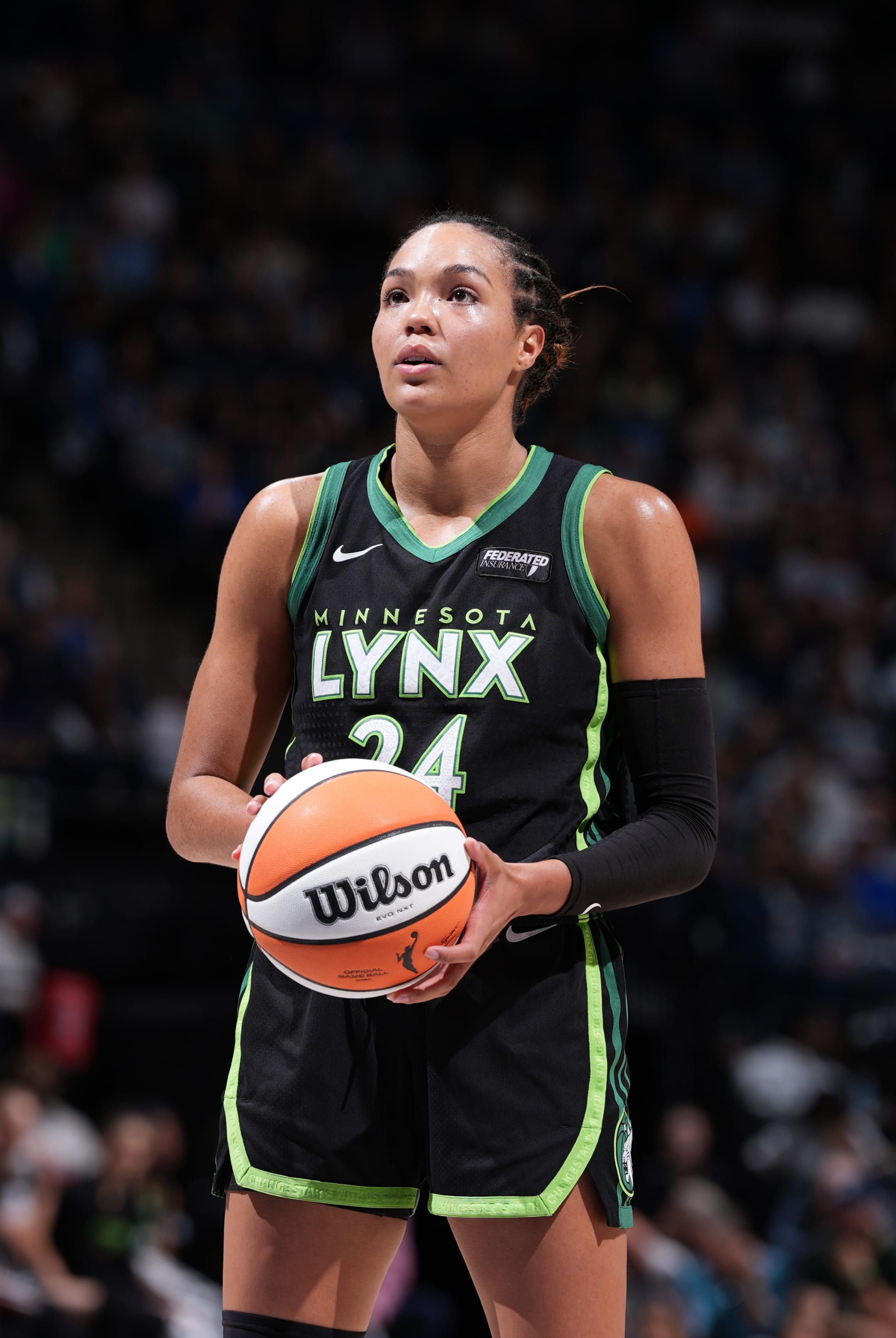 Napheesa Collier #24 of the Minnesota Lynx shoots a free throw  