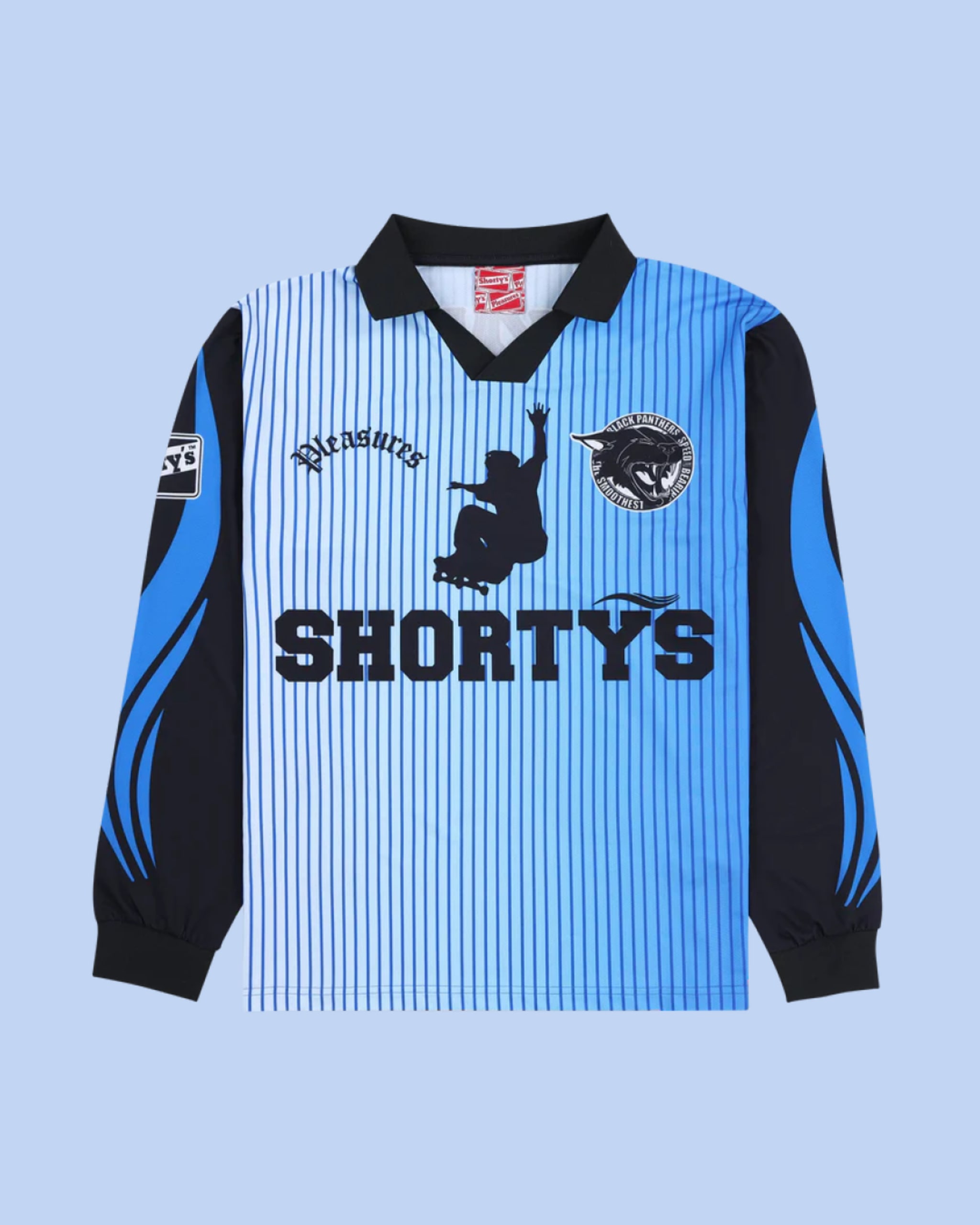 A blue and black long-sleeve shirt with vertical stripes, featuring "Pleasures" and "Shorty's" logos, and a silhouette graphic.
