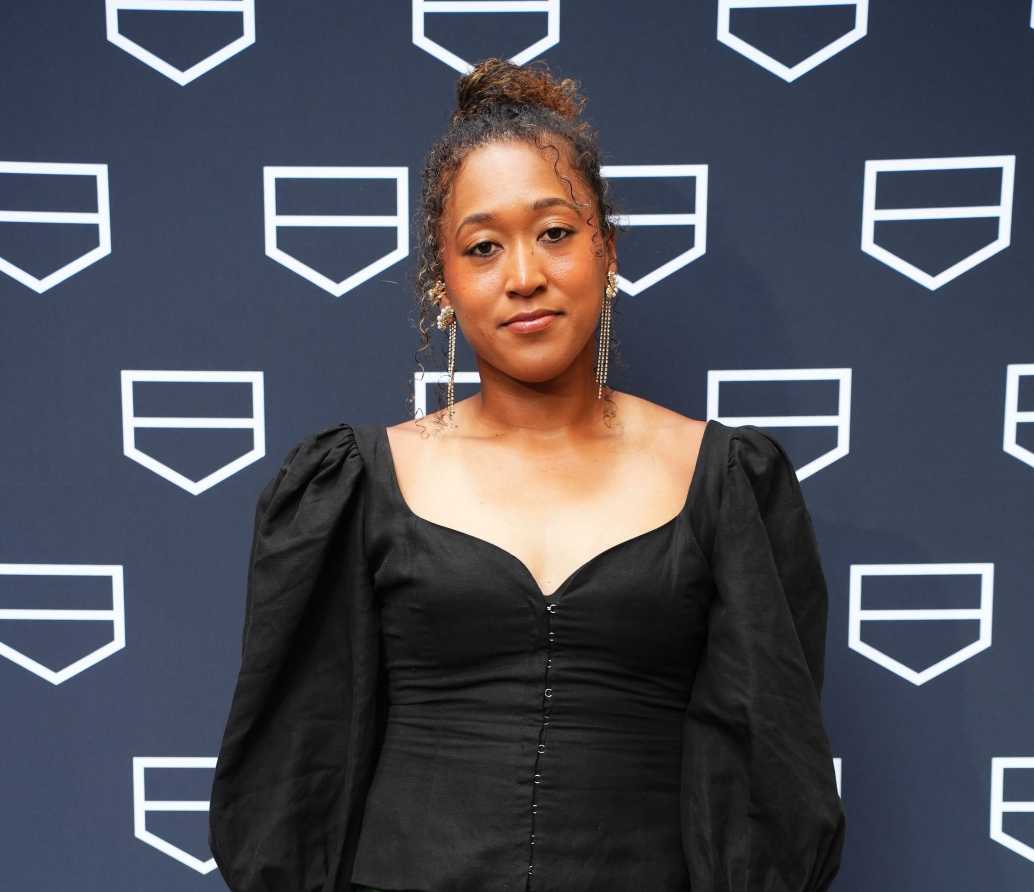 NEW YORK, NEW YORK - AUGUST 22: Naomi Osaka makes a pre-US Open 2024 appearance at TAG Heuer 5th Avenue Boutique on August 22, 2024 in New York City. 