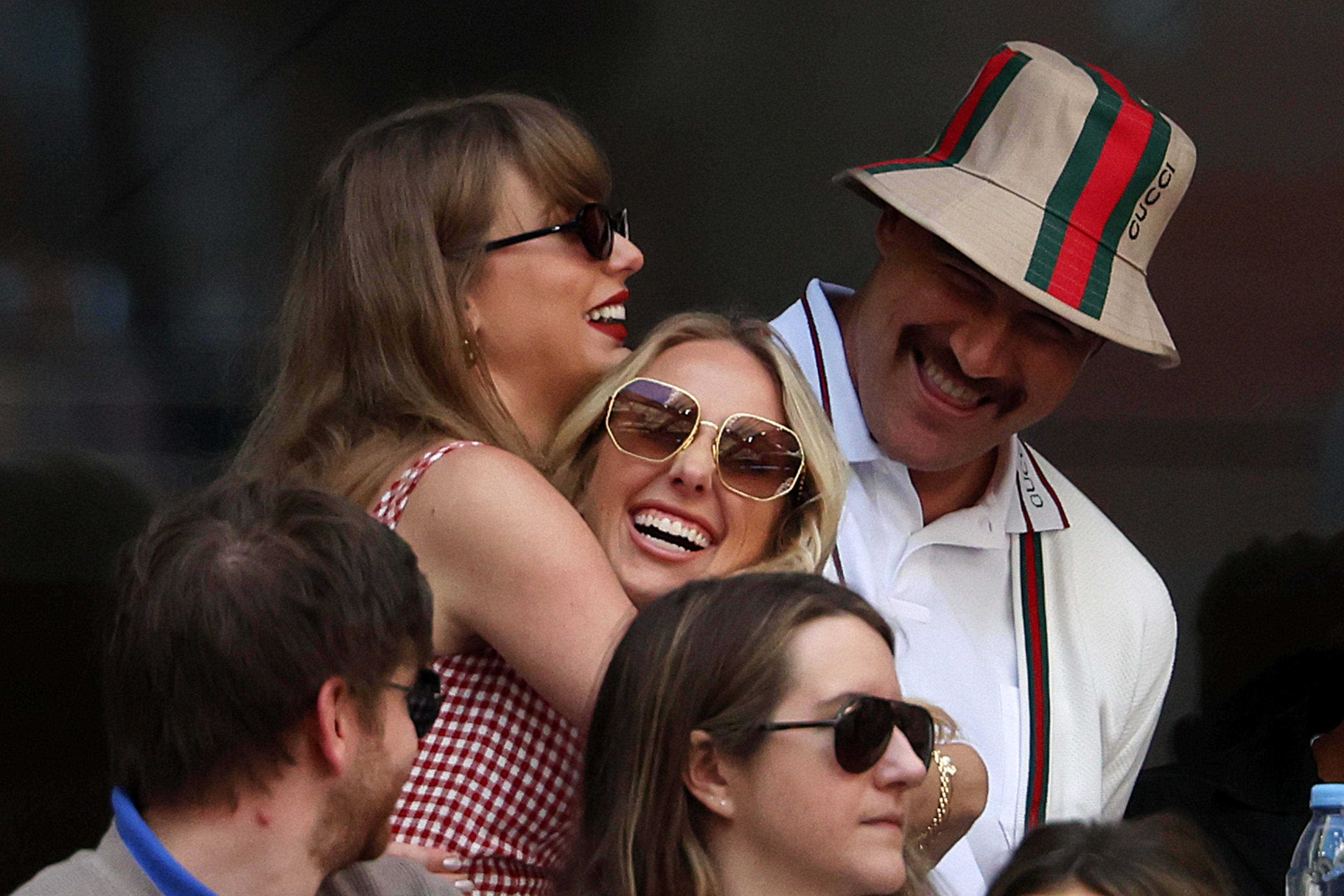 Taylor Swift and Brittany Mahomes hugging at the U.S. Open.