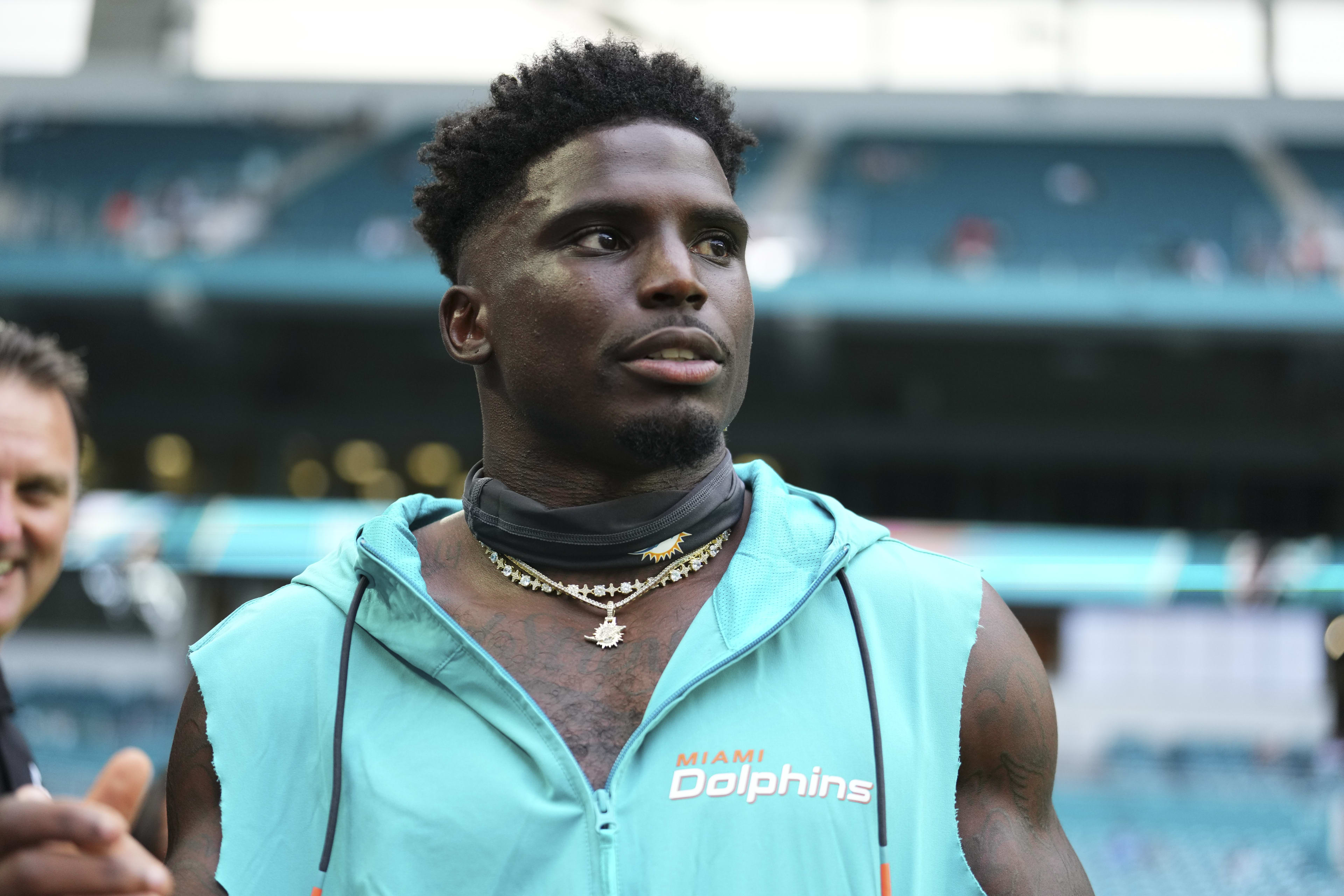 Tyreek Hill #10 of the Miami Dolphins looks on prior to a preseason game against the Atlanta Falcons at Hard Rock Stadium on August 09, 2024 in Miami Gardens, Florida