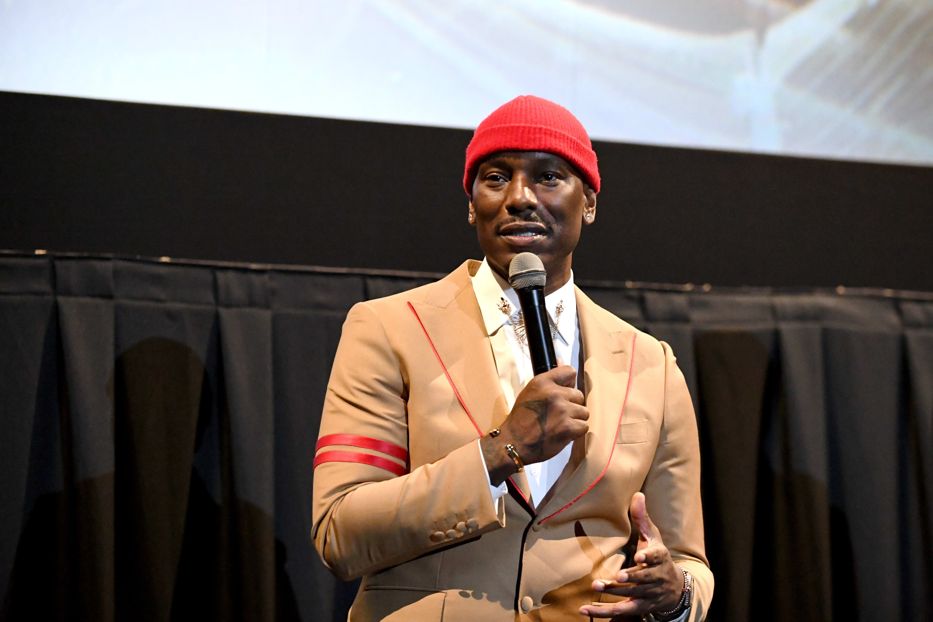 LOS ANGELES, CALIFORNIA - AUGUST 27: Tyrese Gibson speaks onstage during the "1992" Los Angeles Premiere at Regal LA Live on August 27, 2024 in Los Angeles, California. 