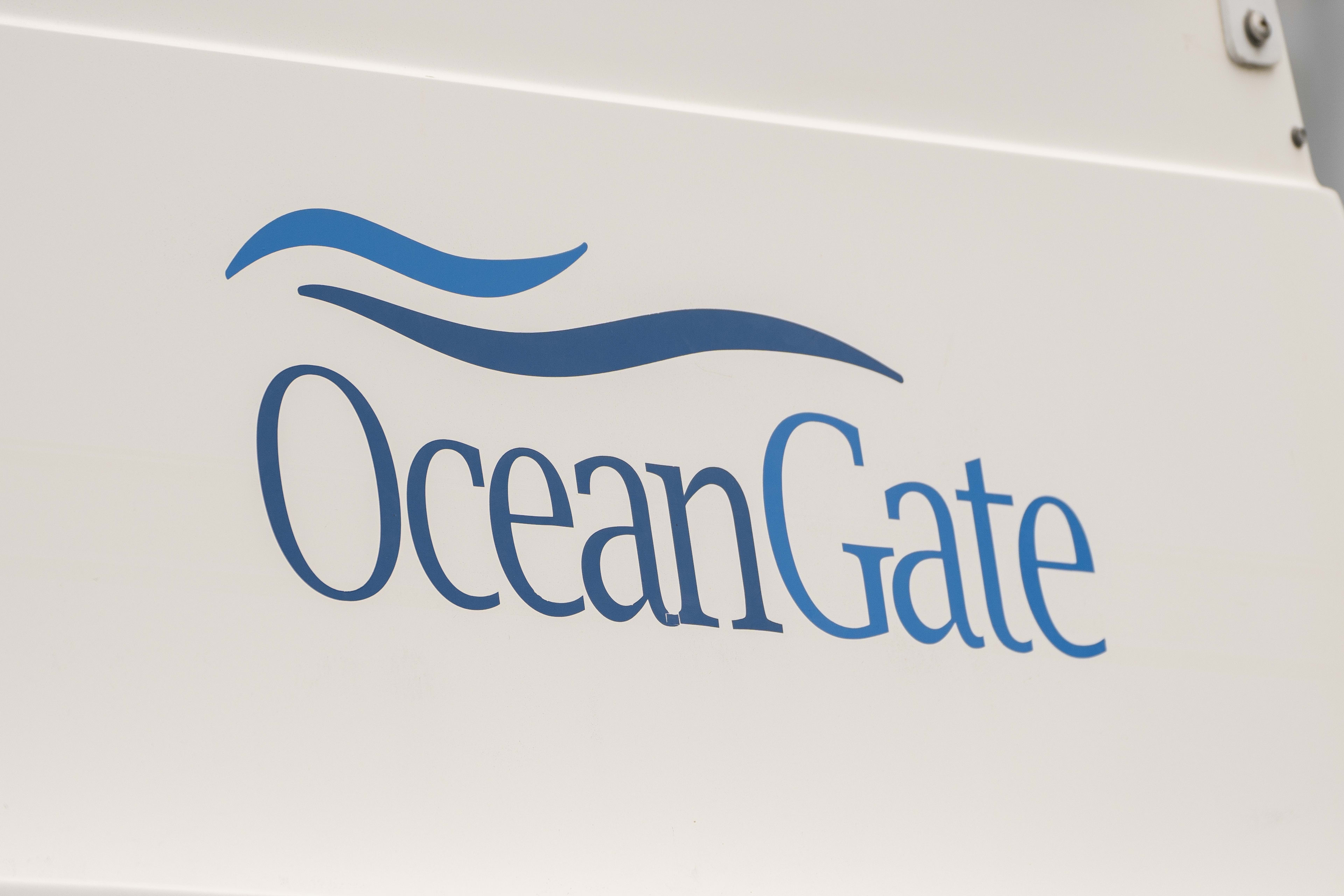 The OceanGate logo is seen on a vessel stored near the OceanGate offices on June 21, 2023 in Everett, Washington. OceanGate, owner of the missing submersible carrying five people trying to visit the Titanic wreckage in the North Atlantic, operates out of Everett. 