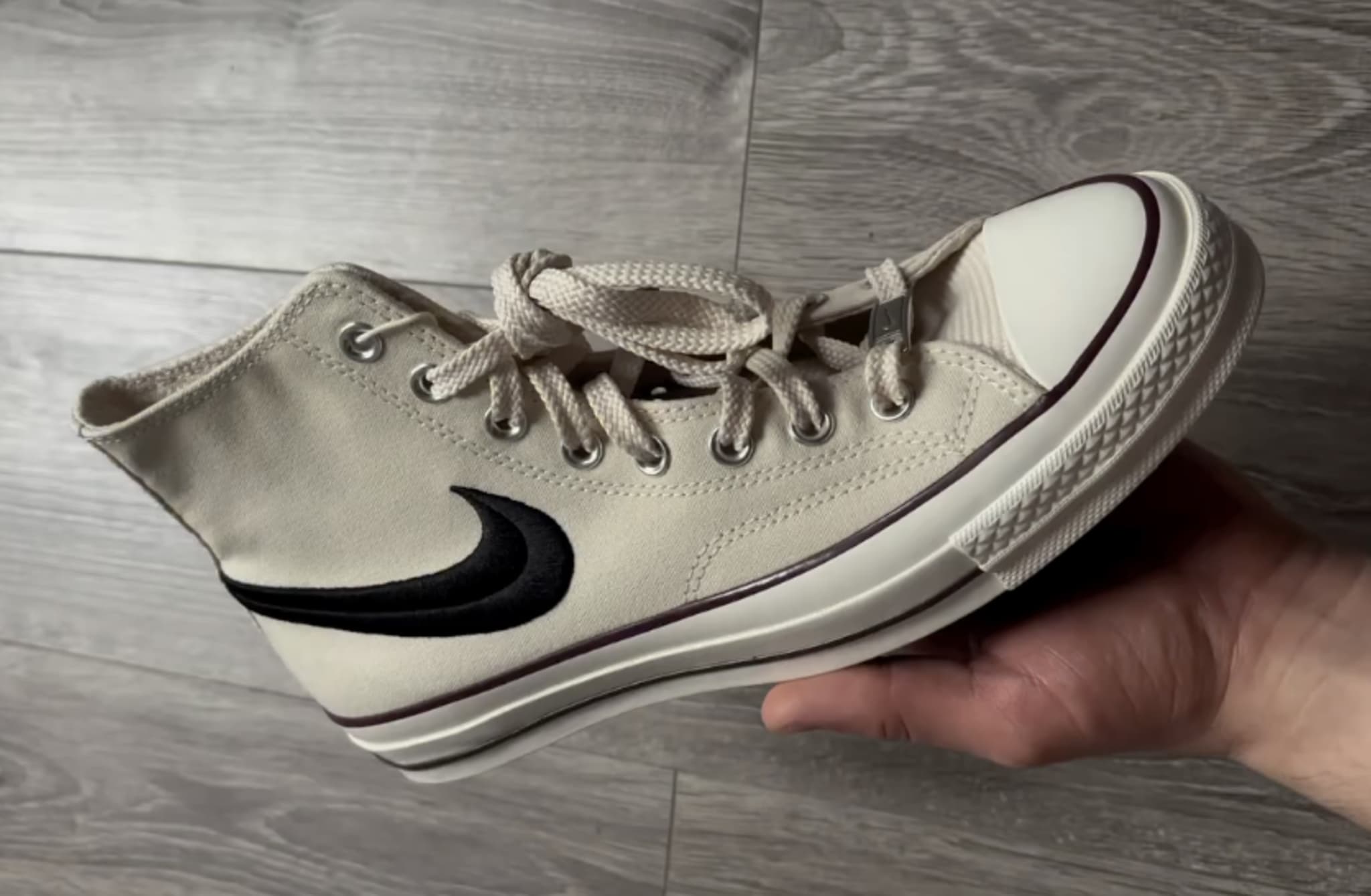 swoosh chuck taylor