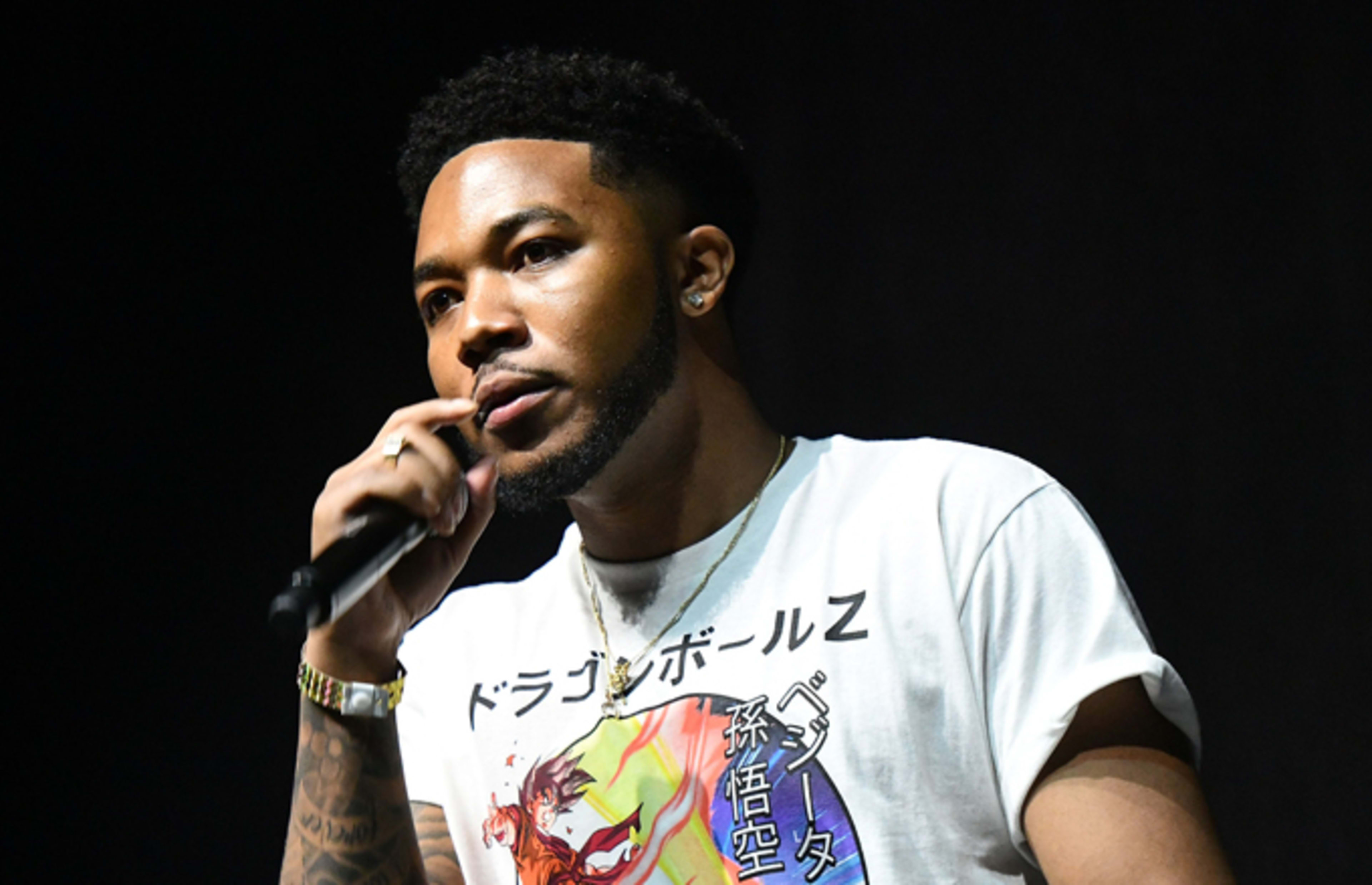 Cozz Rapper Who's Who of Dreamville: What You Need to Know About Each Artist