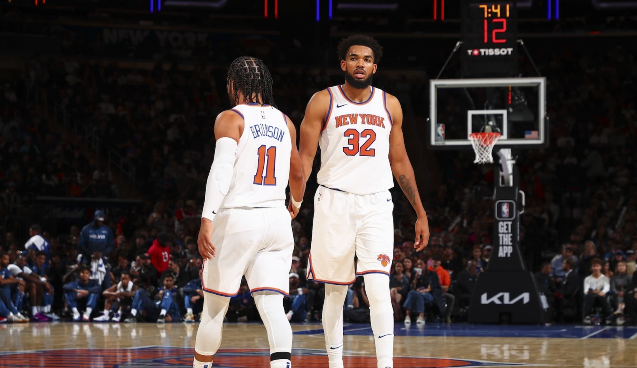 NEW YORK, NY - OCTOBER 13: Karl-Anthony Towns #32 of the New York Knicks high-fives teammate Jalen Brunson #11 during the game on October 13, 2024 at Madison Square Garden in New York City, New York. 
