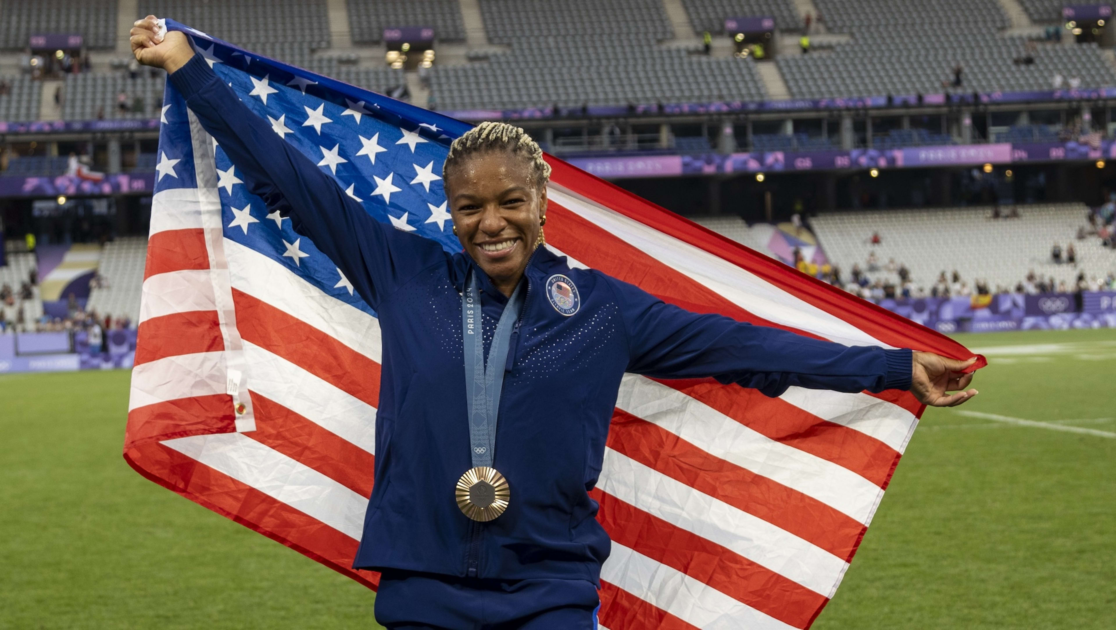 Ariana Ramsey posing with a medal