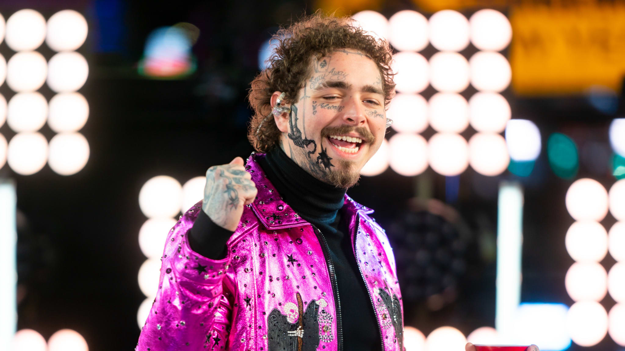 Post Malone performing at a show.