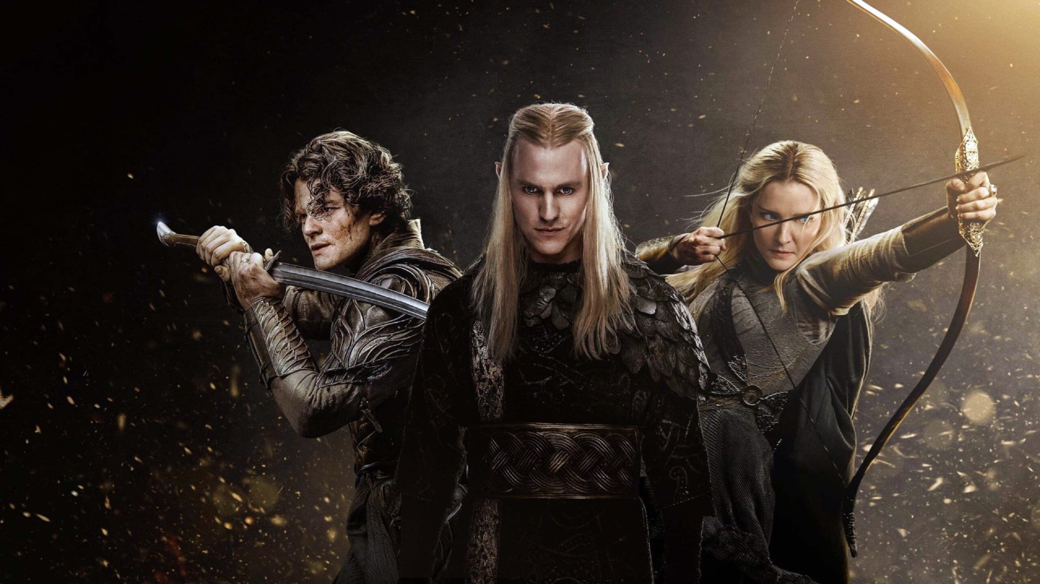 Three The Lord of the Rings: The Rings of Power characters huddle together in the center.