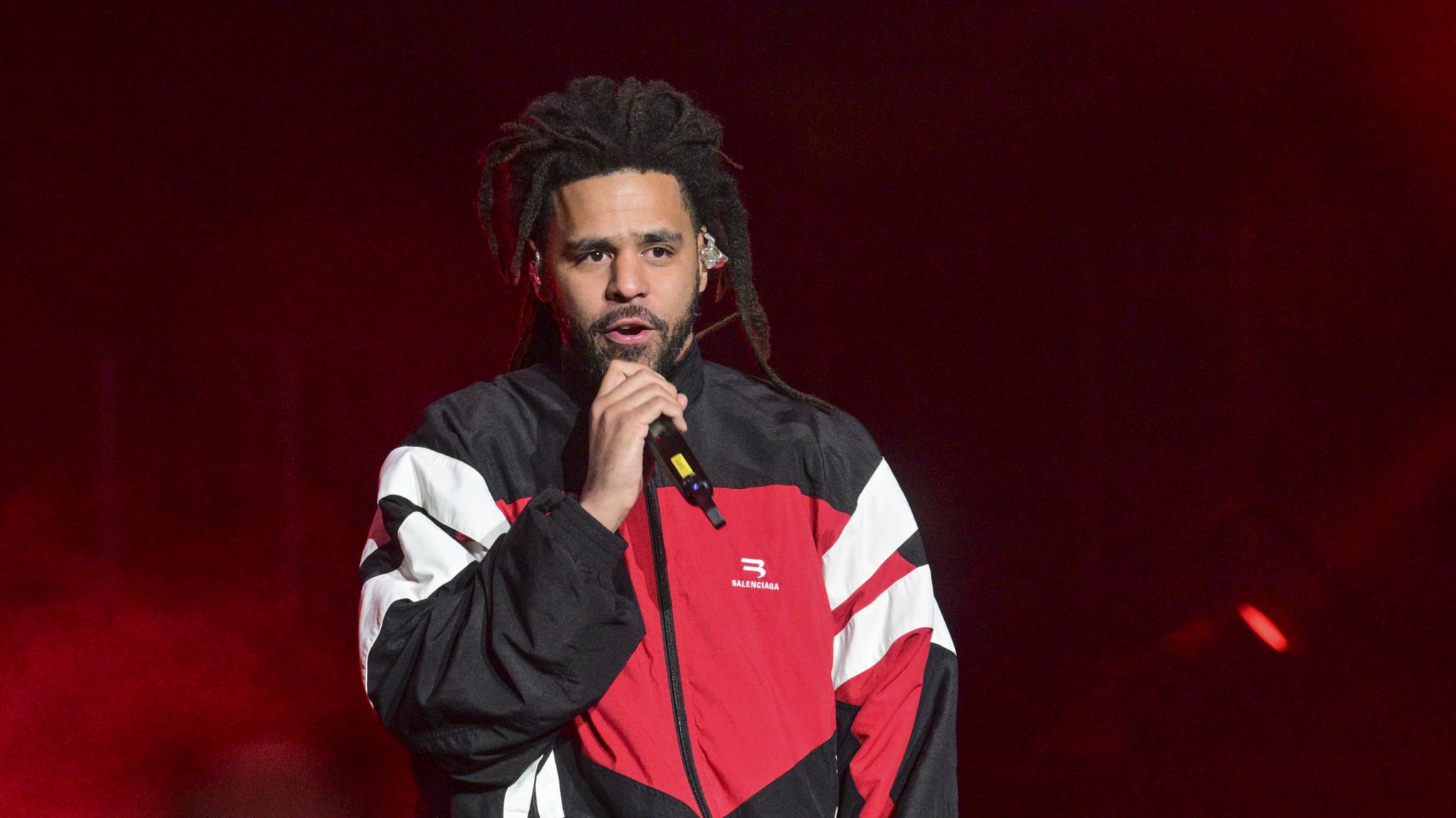 J. Cole performs onstage during Lil Baby & Friends Birthday Celebration at State Farm Arena on December 27, 2023 in Atlanta, Georgia. 
