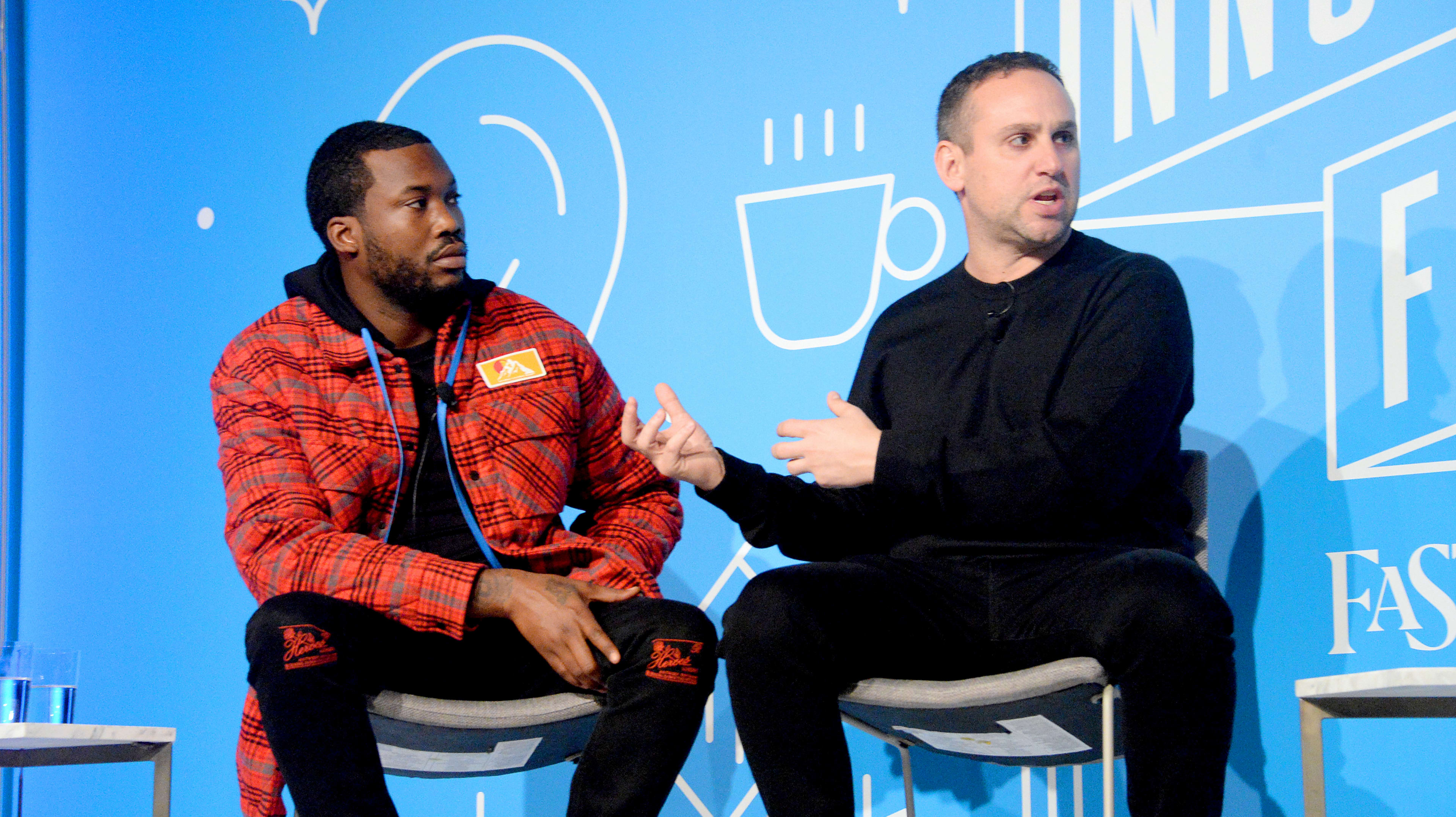 NEW YORK, NEW YORK - NOVEMBER 06: Meek Mill and Michael Rubin speak on stage at the "Justice for All: Reforming a Broken System" at the Fast Company Innovation Festival - Day 2 on November 06, 2019 in New York City