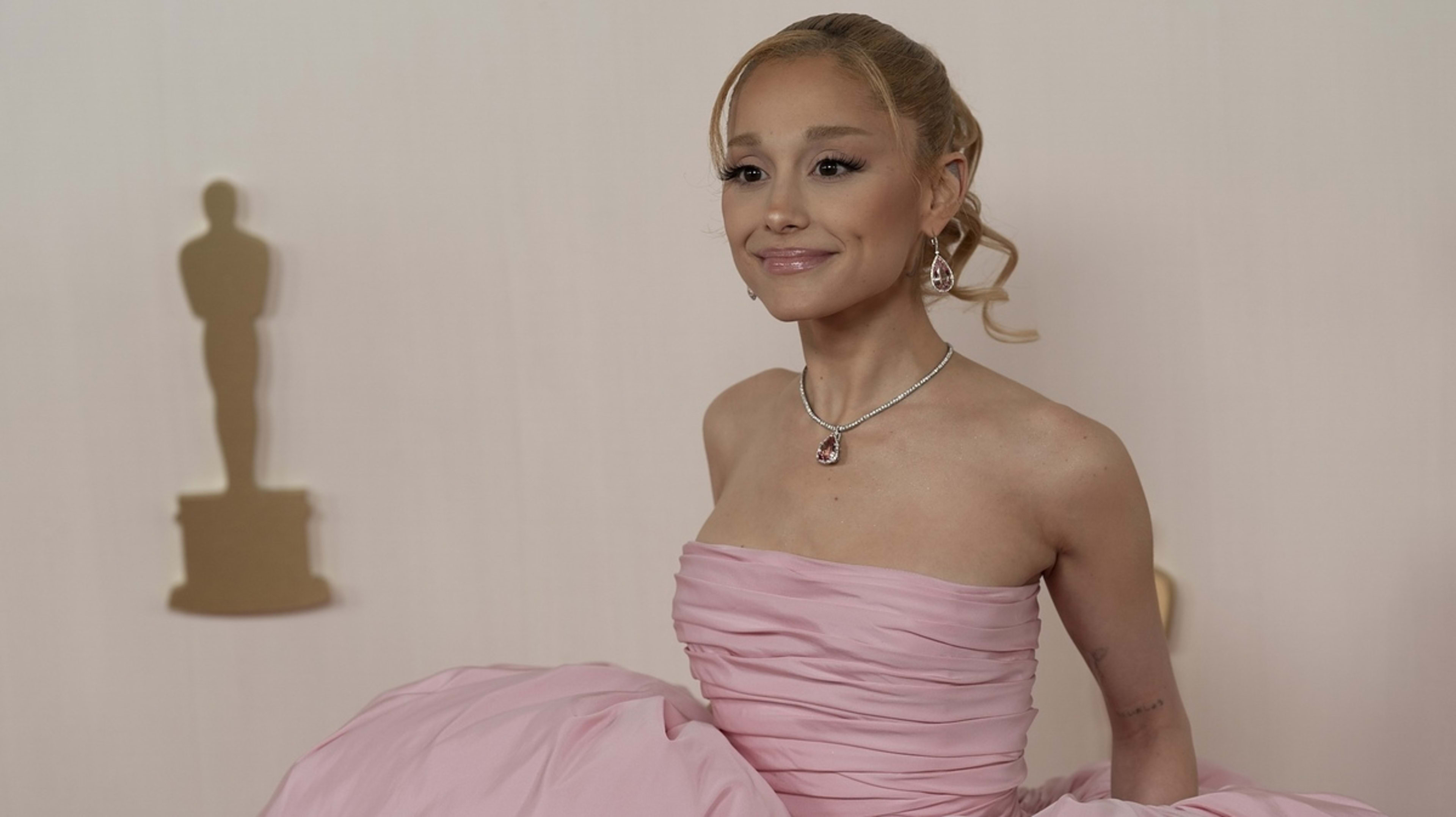 Ariana DeBose in a strapless, voluminous gown with statement jewelry on the red carpet